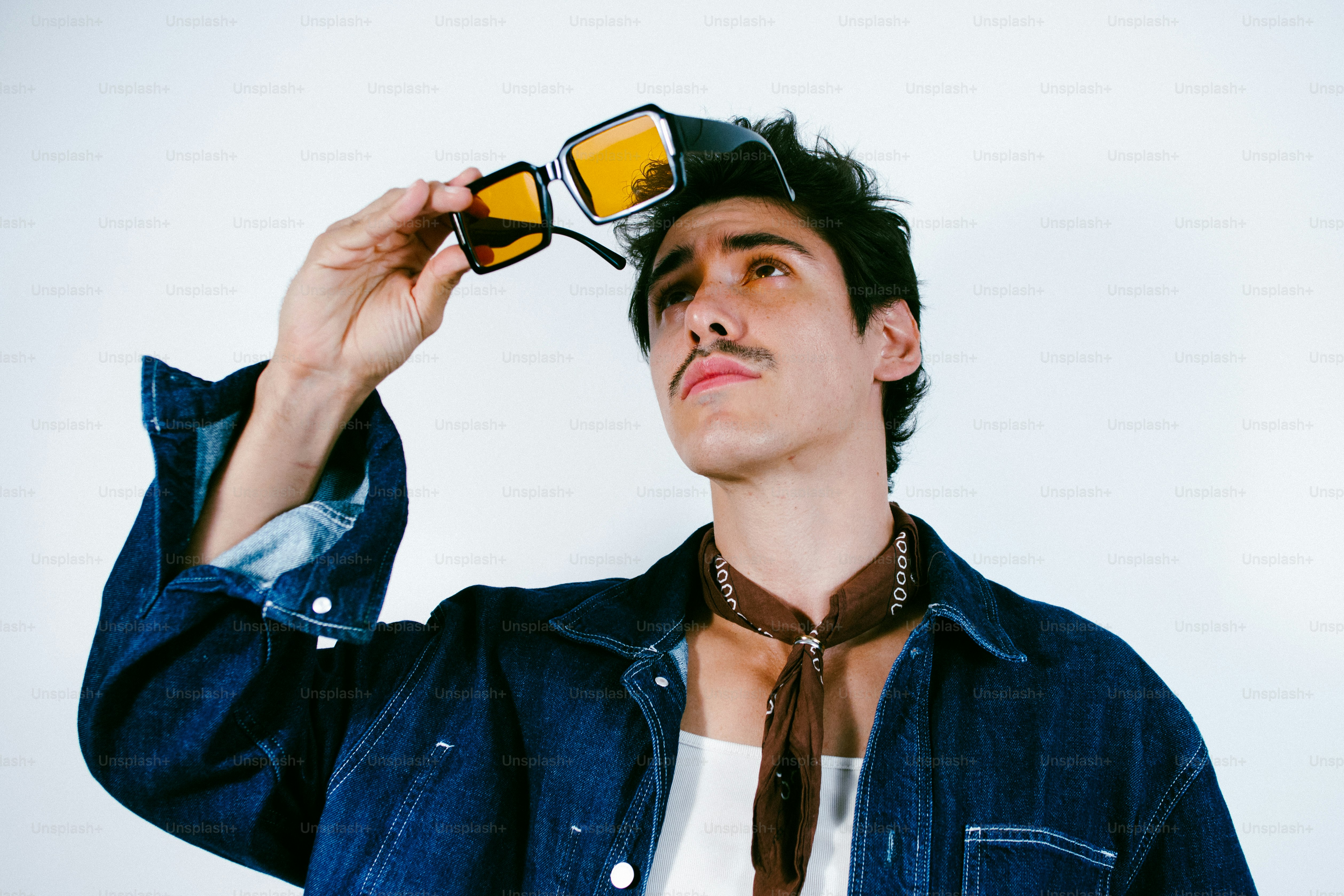 Man with mustache and denim jacket - Photo on Unsplash+