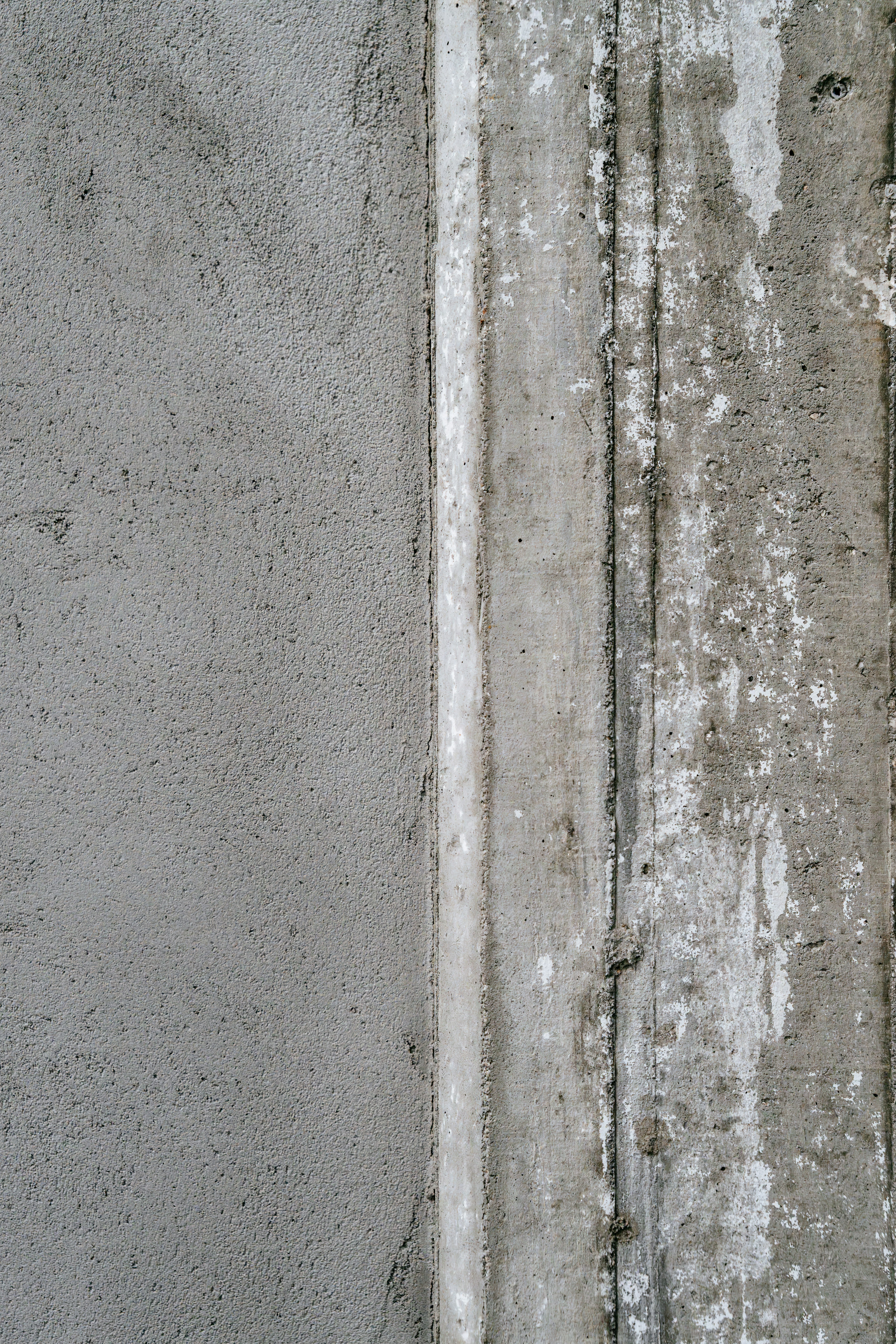 Grey plaster and concrete wall - Photo on Unsplash+