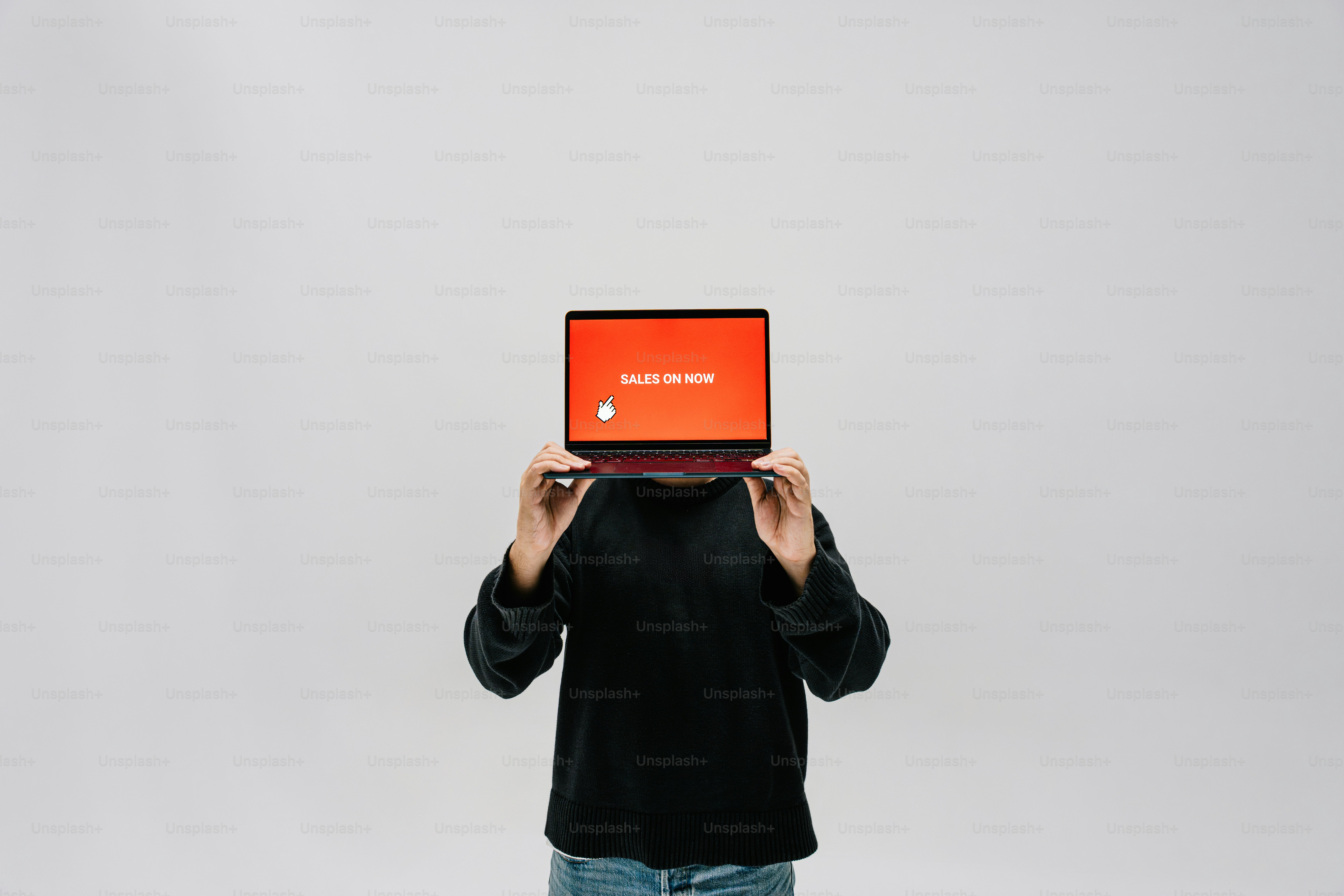 Person holding laptop with red screen - Photo on Unsplash+