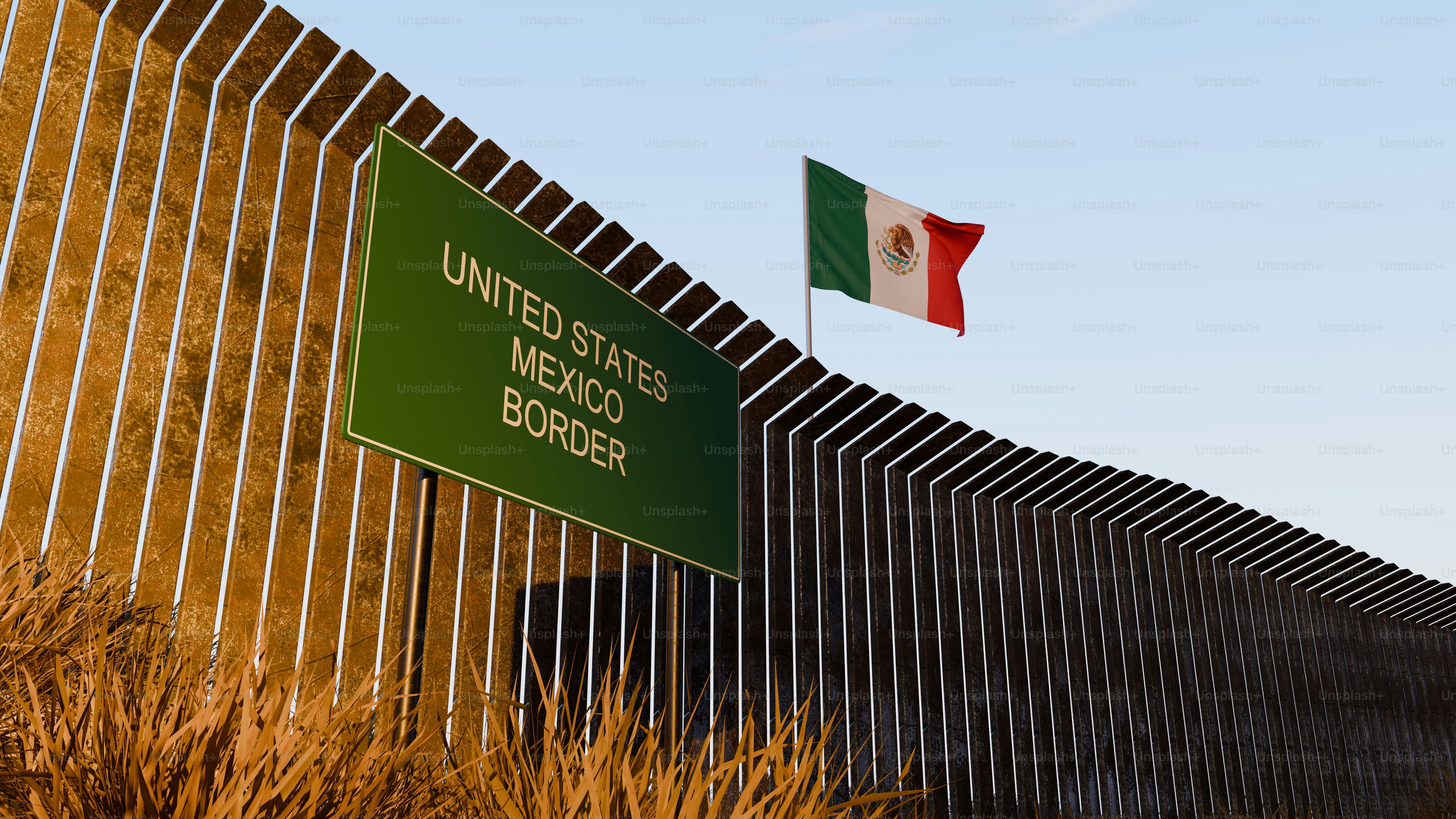 United States Mexico border sign with barrier - Photo on Unsplash+