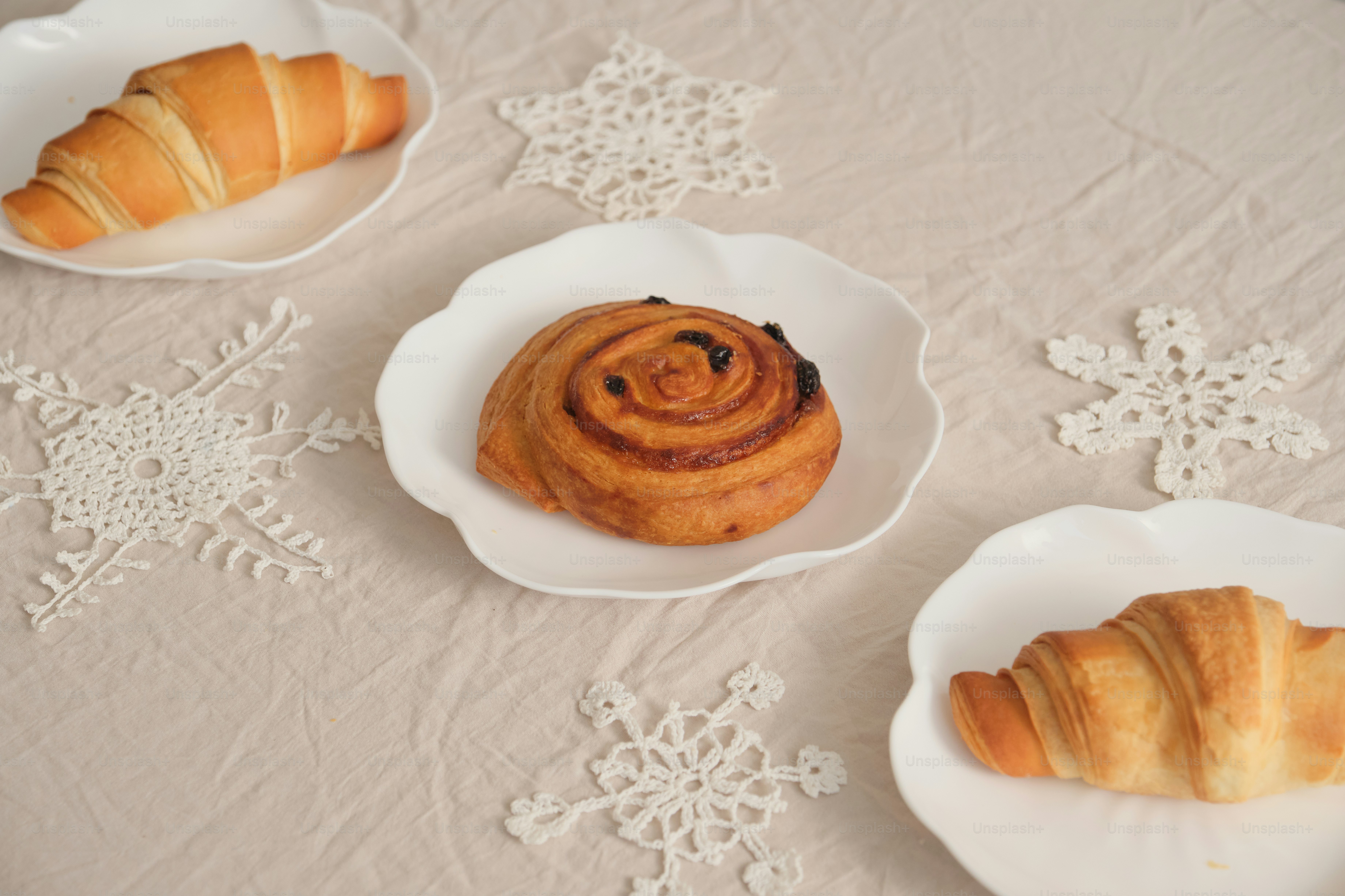 Citrus fruits and lace on tablecloth - Photo on Unsplash+