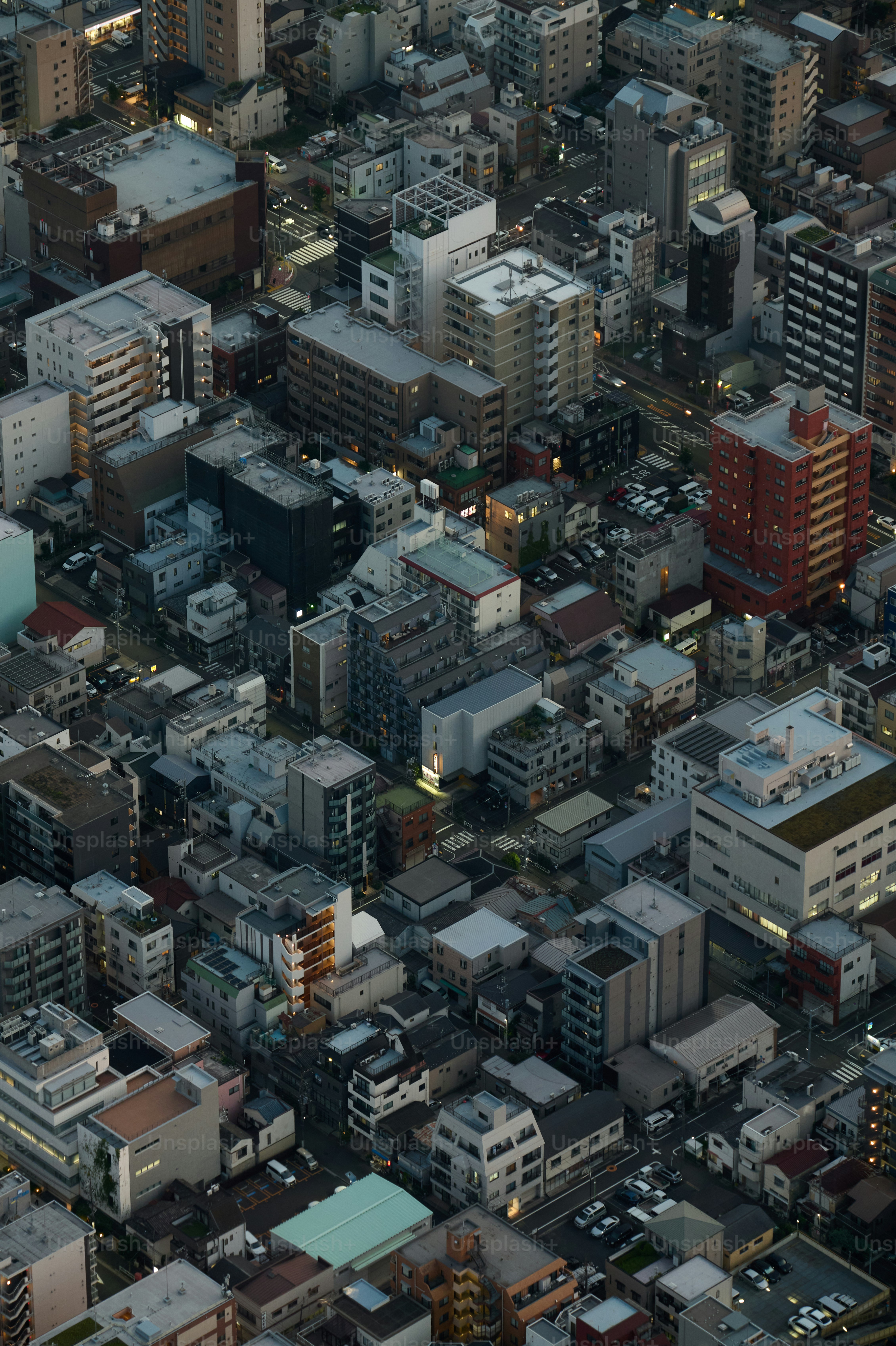 Dense urban neighborhood at dusk - Photo on Unsplash+