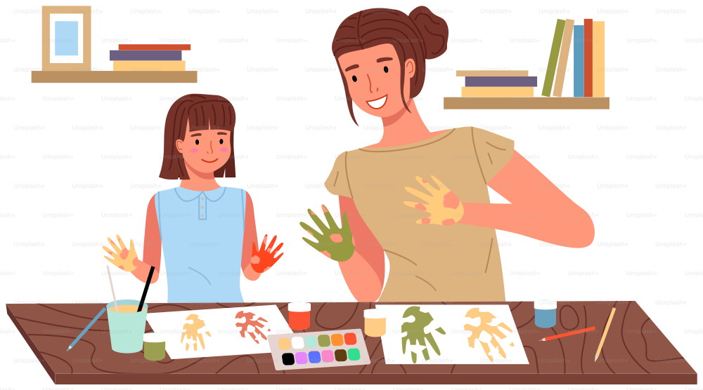 Mother and daughter painting at home. Mom and child study or playing together. Woman teaches girl to draw. Happy family pastime. People paint hands with dye and leaves traces of palms on paper