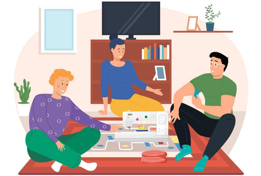 Family members playing cards and other board game sitting on the floor with sewing machine. Friends have good time together. Happy people are resting. Clothing designers are discussing a new model
