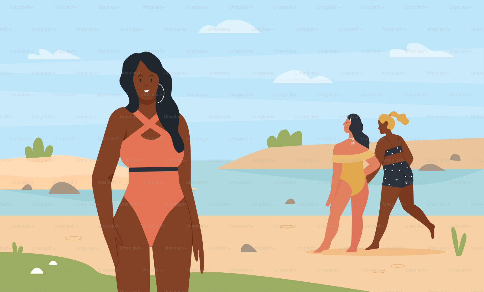 Three people in swimwear on a sandy beach with blue water and sky