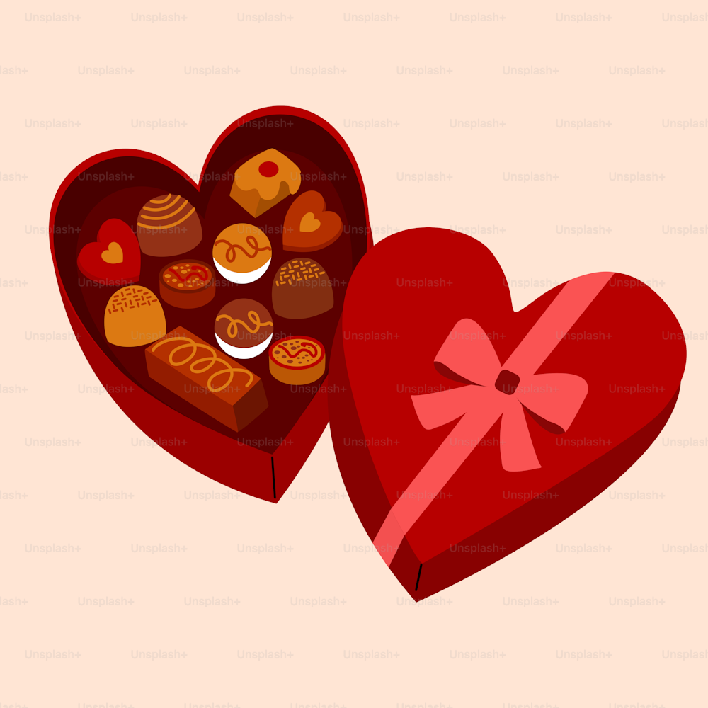 duas caixas em forma de coração cheias de doces variados