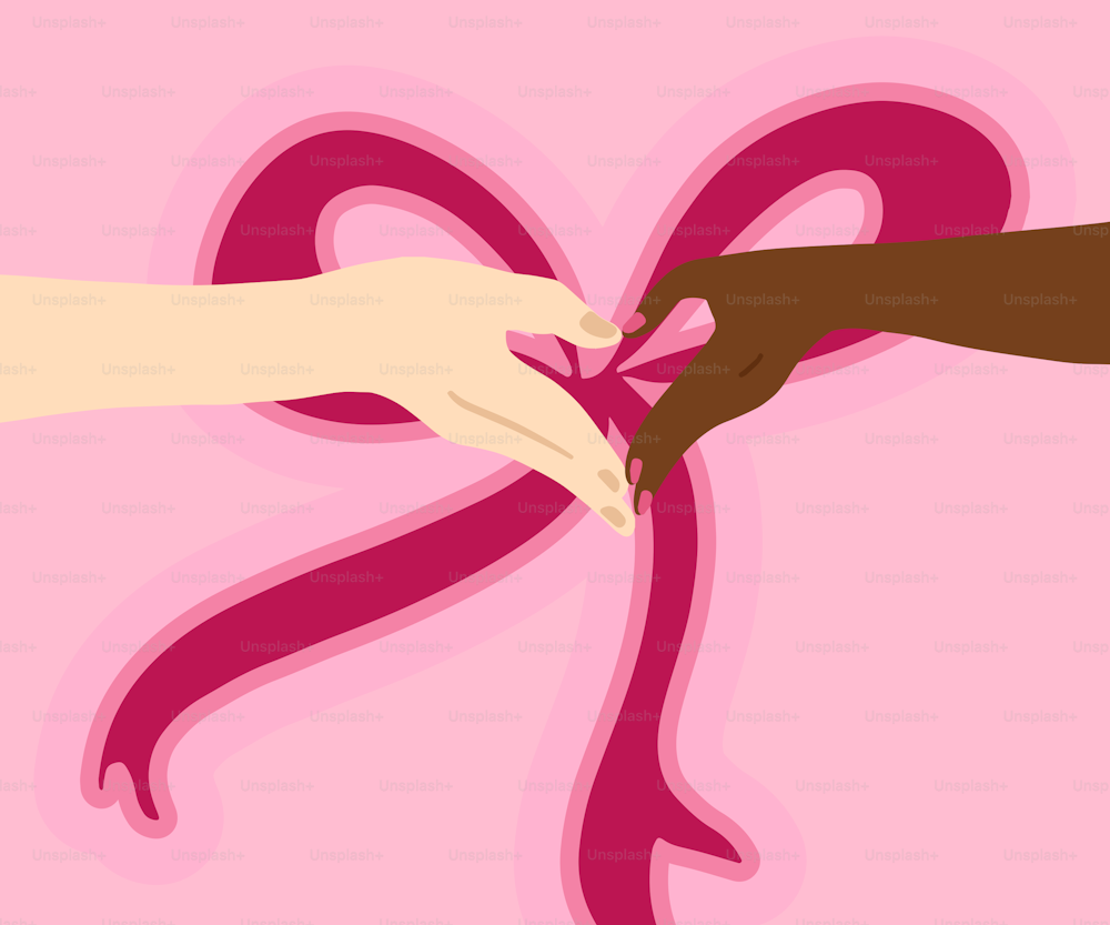 um par de mãos segurando uma fita rosa