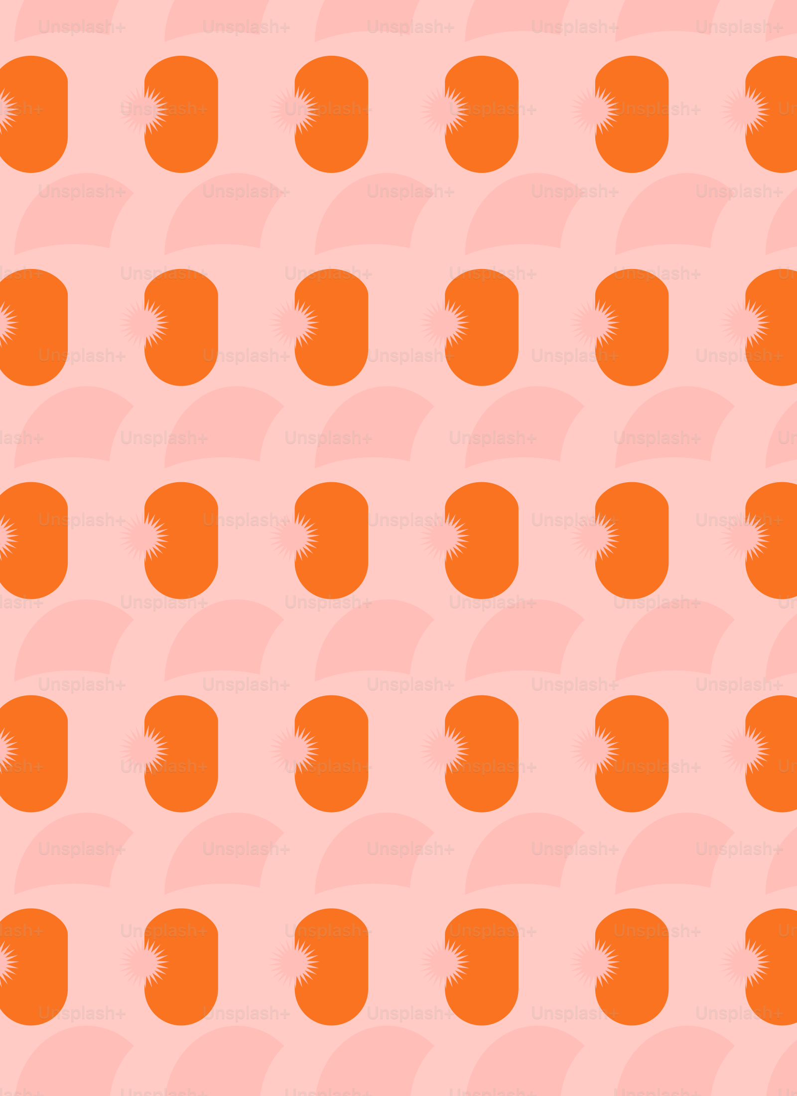 Ein Muster aus orangefarbenen Kreisen auf grauem Hintergrund