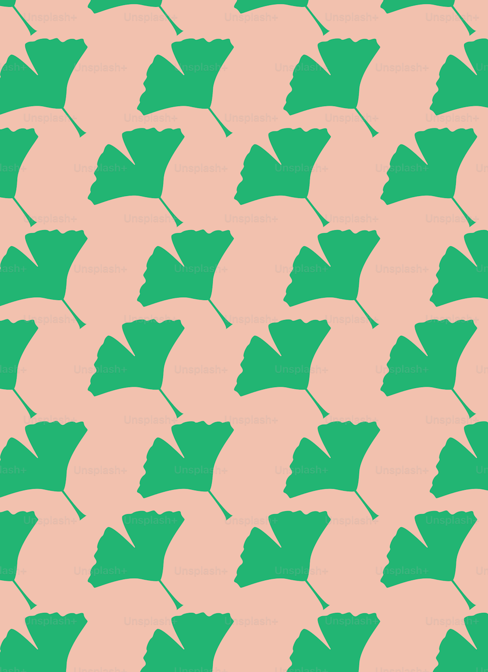 a pattern of green leaves on a pink background