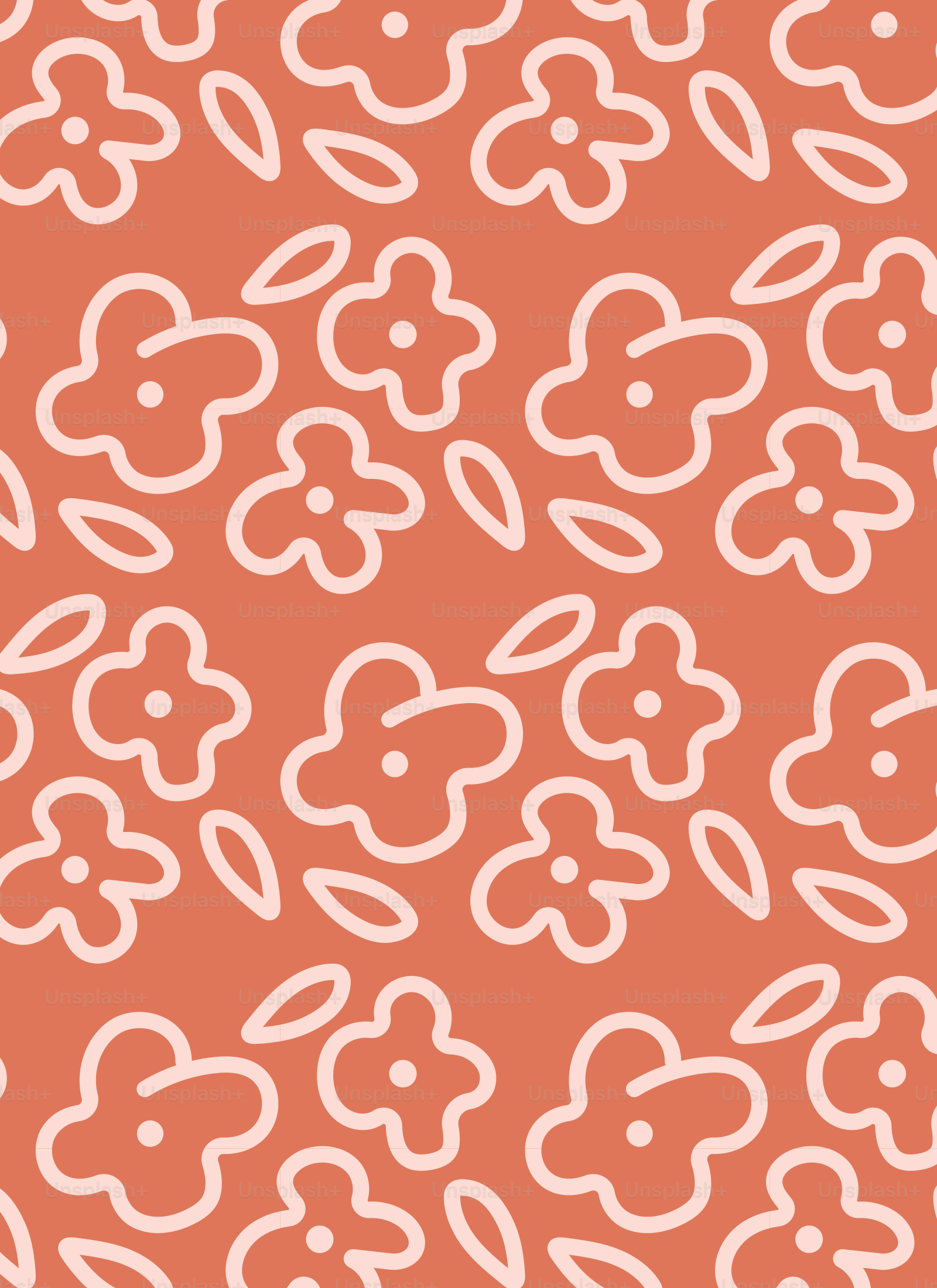 an orange background with white flowers on it
