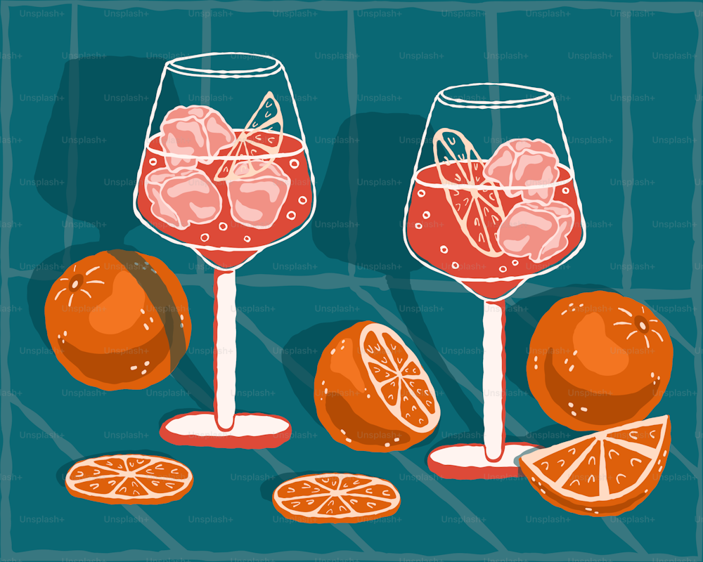 파란색 배경에 주황색 조각이 있는 와인 두 잔