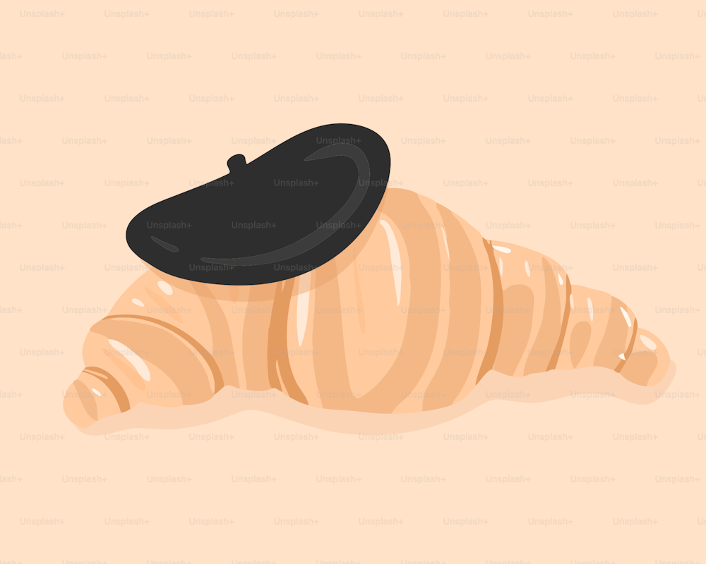 a picture of a black hat on top of a croissant
