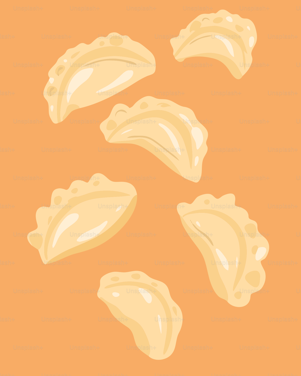 a group of dumplings sitting on top of an orange surface