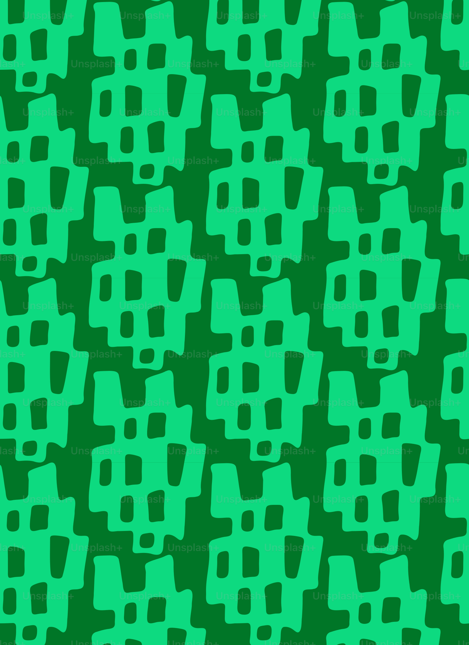 a green and black background with small squares