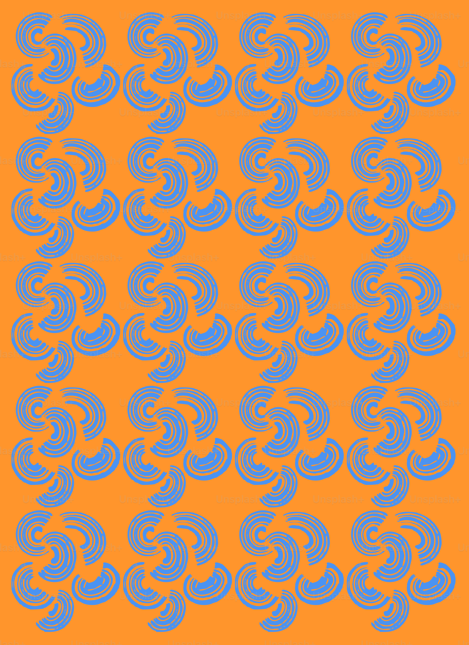 a blue and orange pattern on an orange background