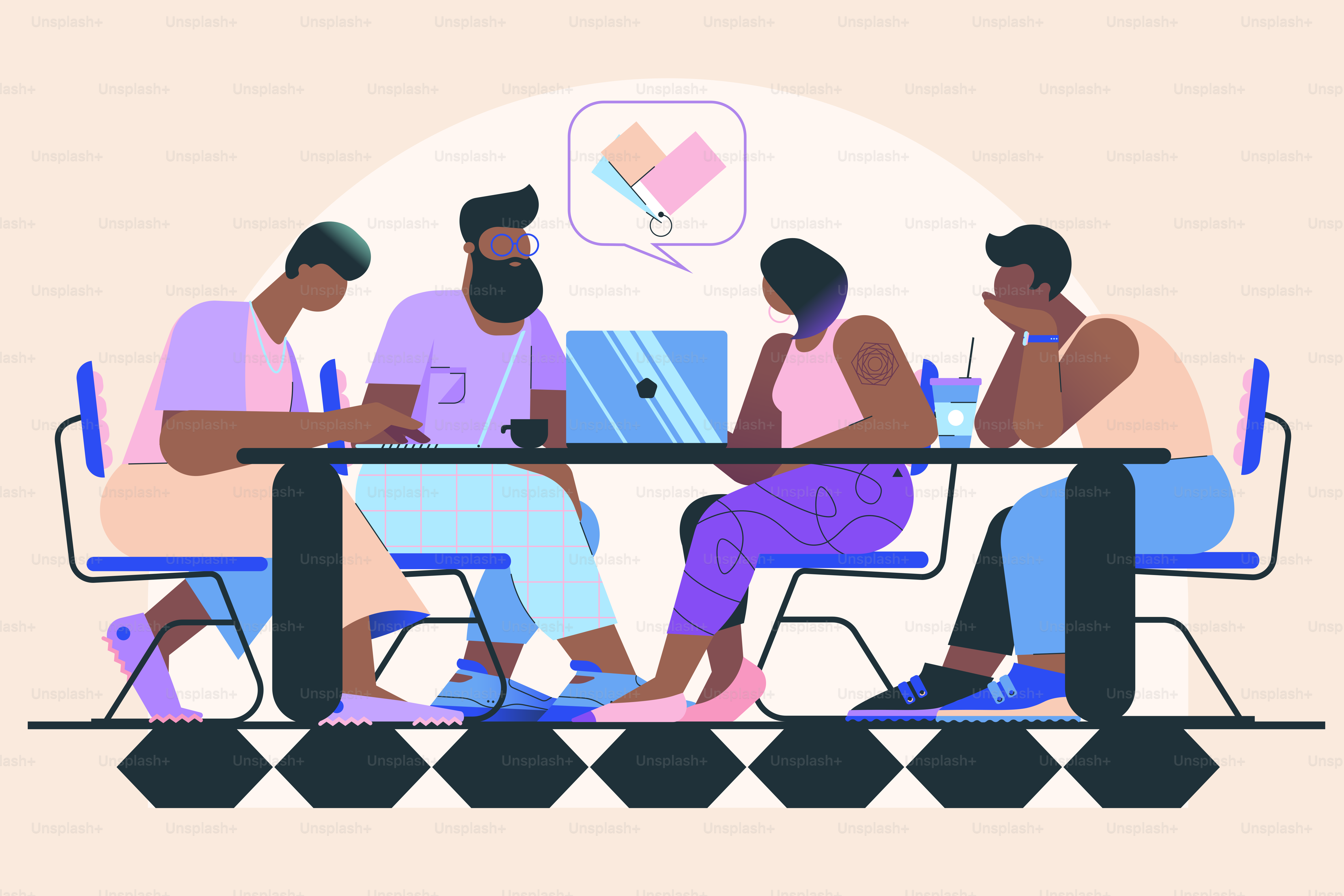 a group of people sitting at a table with laptops