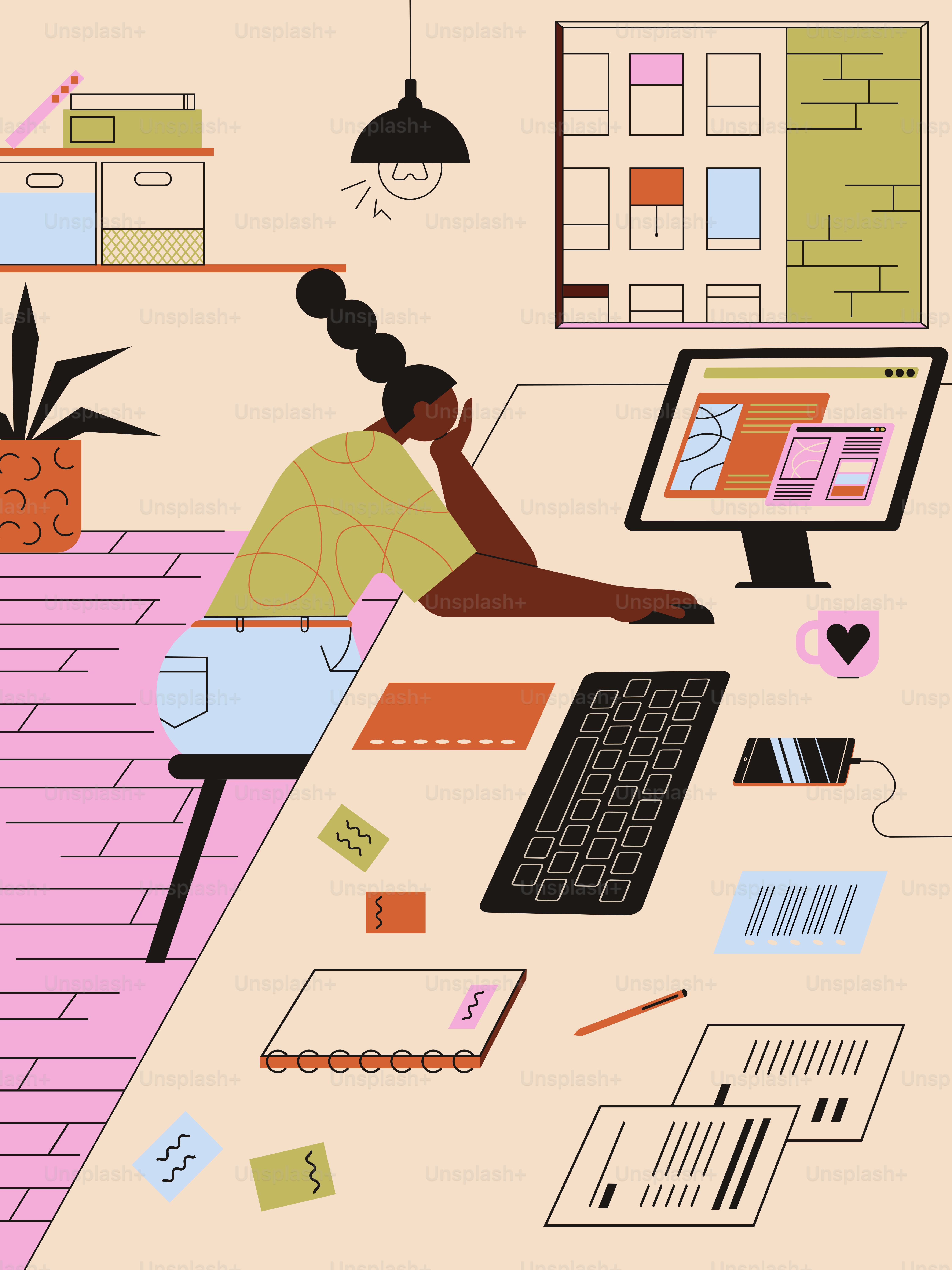 una persona seduta a una scrivania con un computer