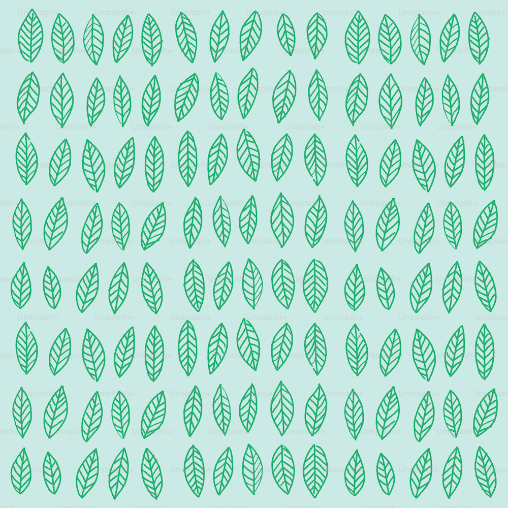 un patrón de hojas verdes sobre un fondo azul