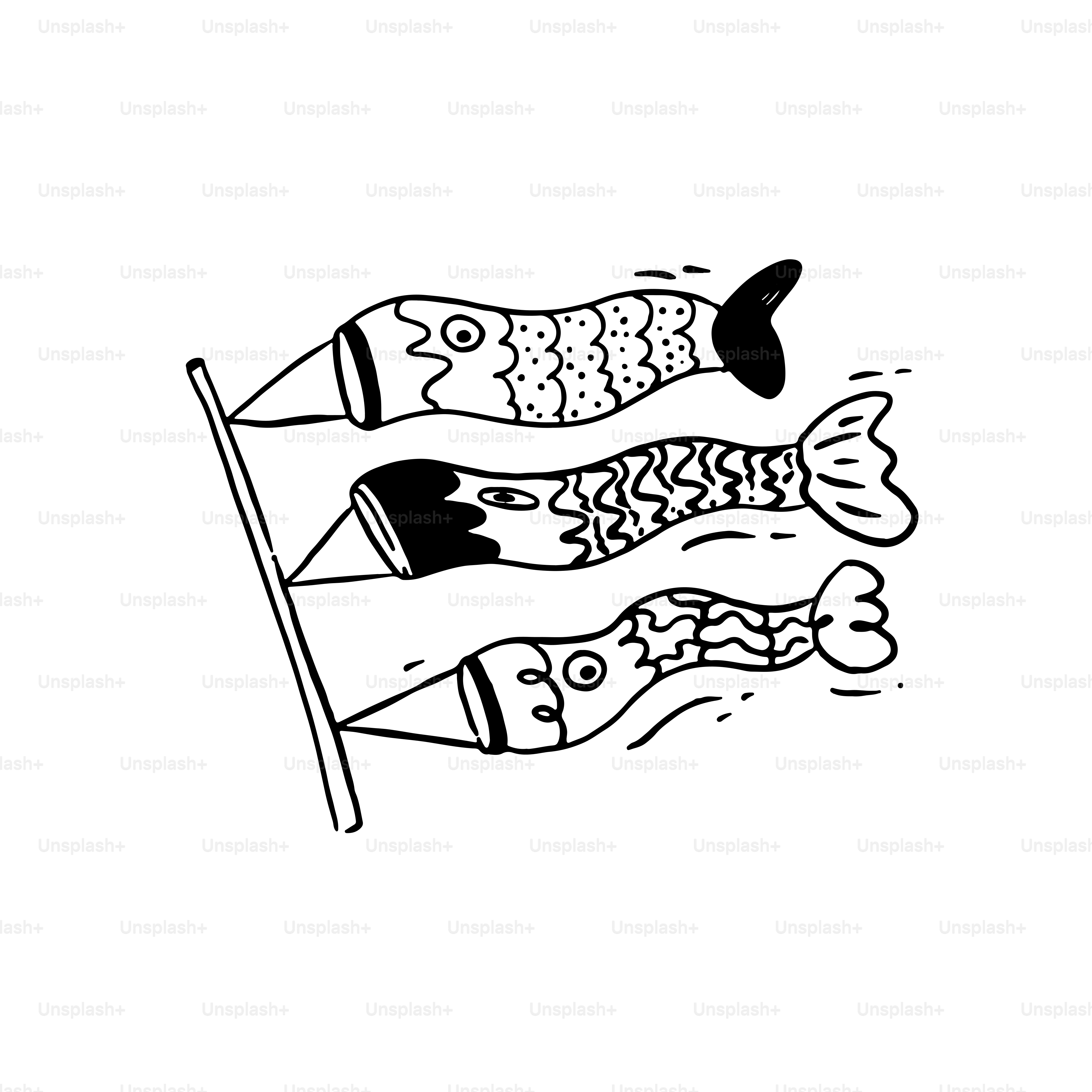 Three decorative fish banners on a pole