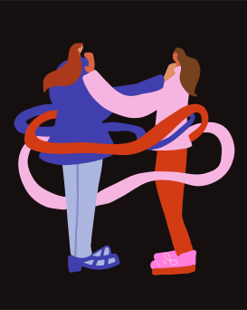 Two women embracing with flowing colorful ribbons