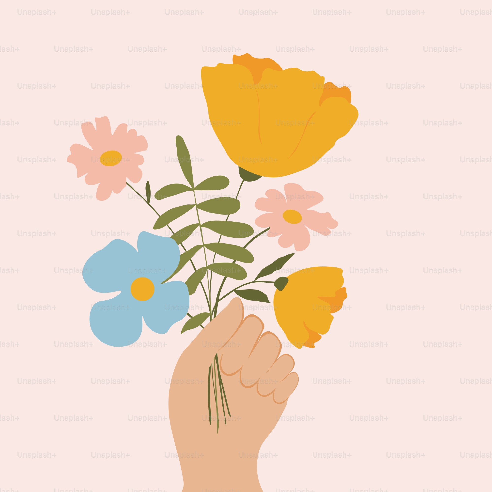 Hand holding a bouquet of colorful wildflowers.