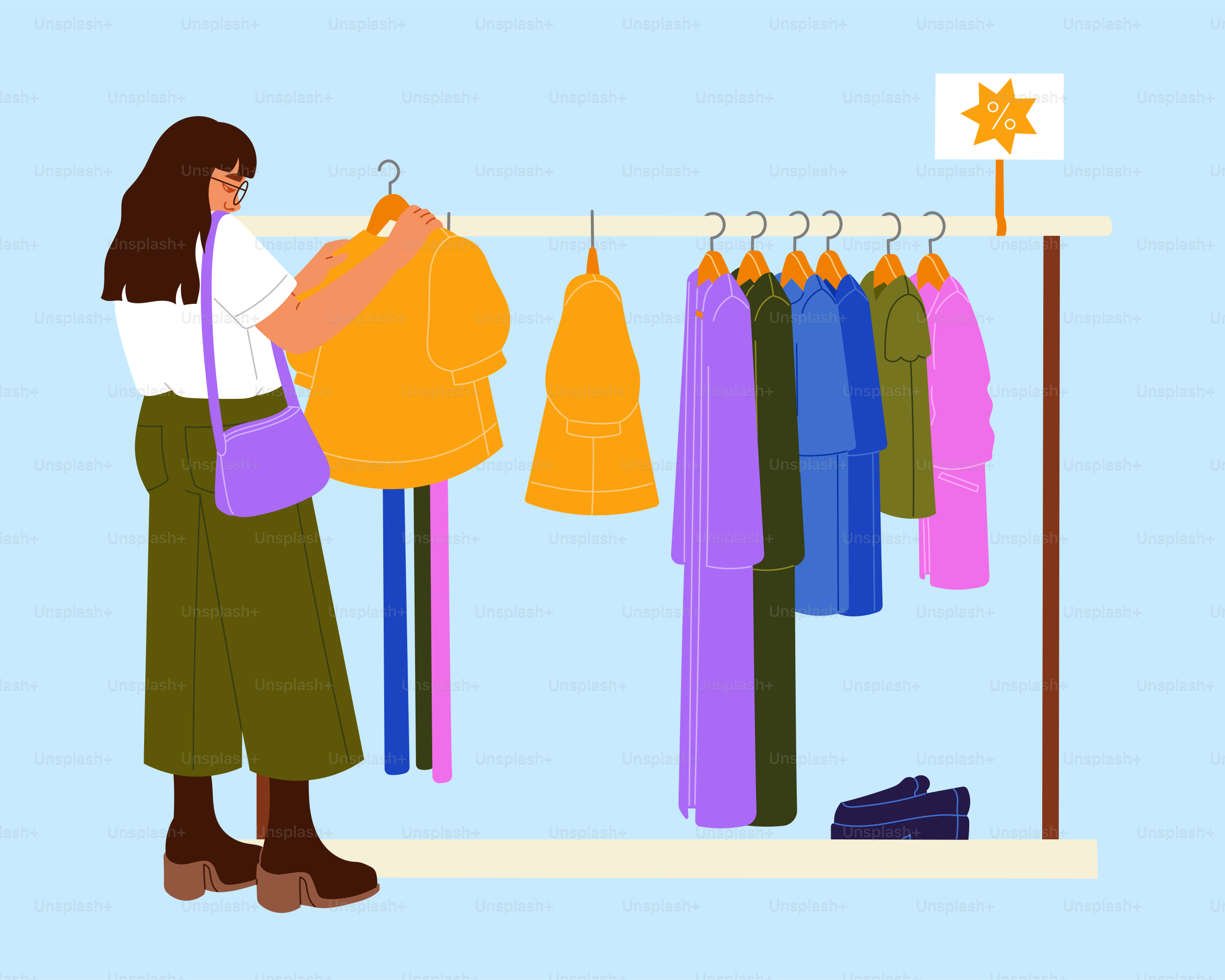 Woman choosing clothes from a rack
