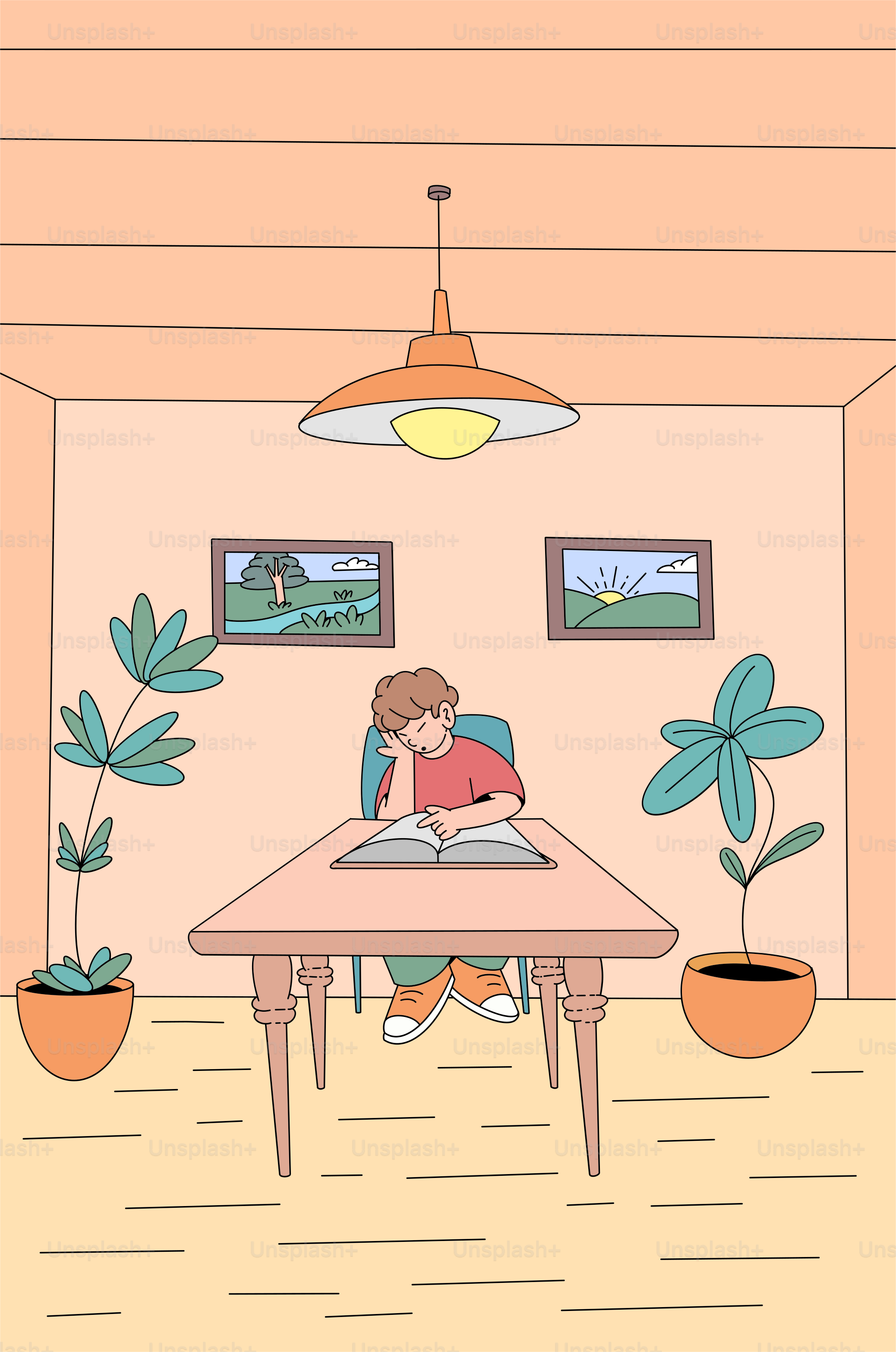 A young boy reads a book at a table.