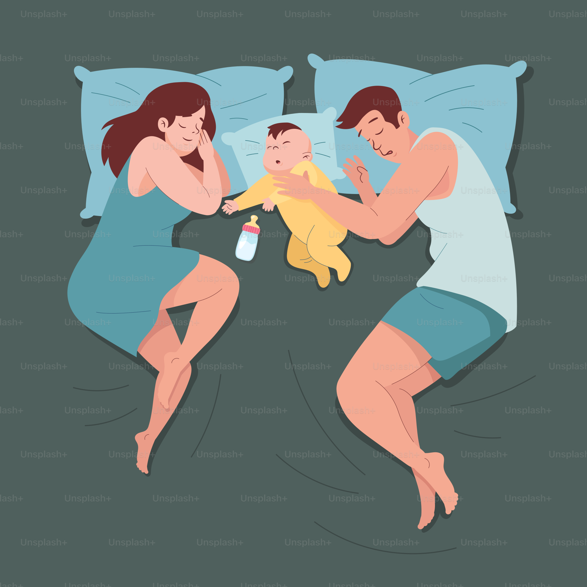 a man and woman laying in bed with a baby