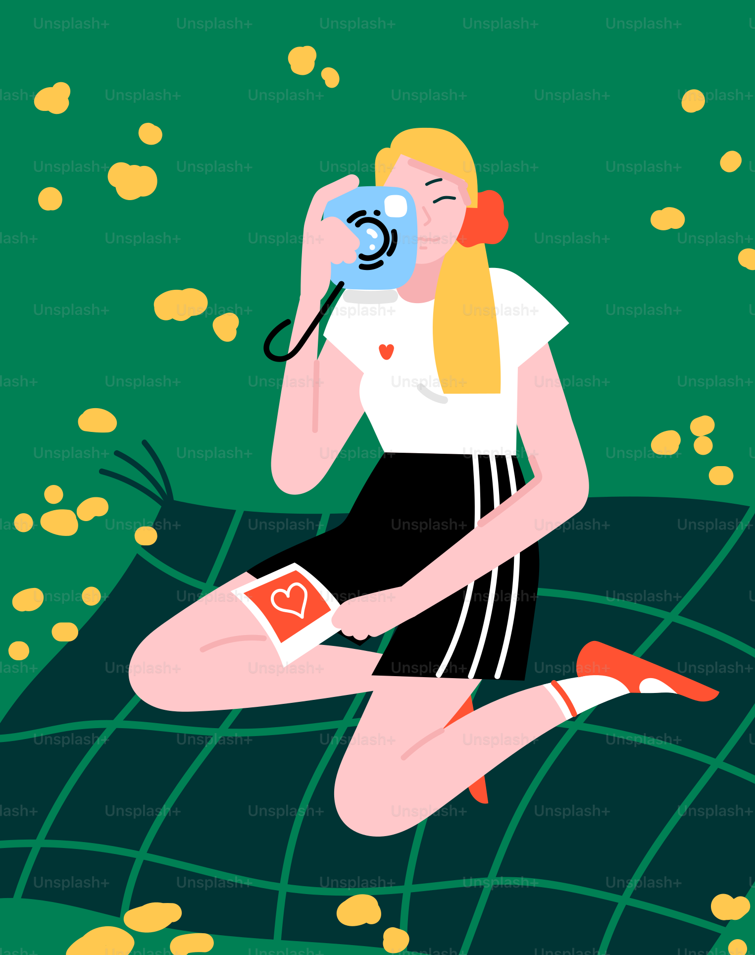 a woman sitting on the ground holding a camera