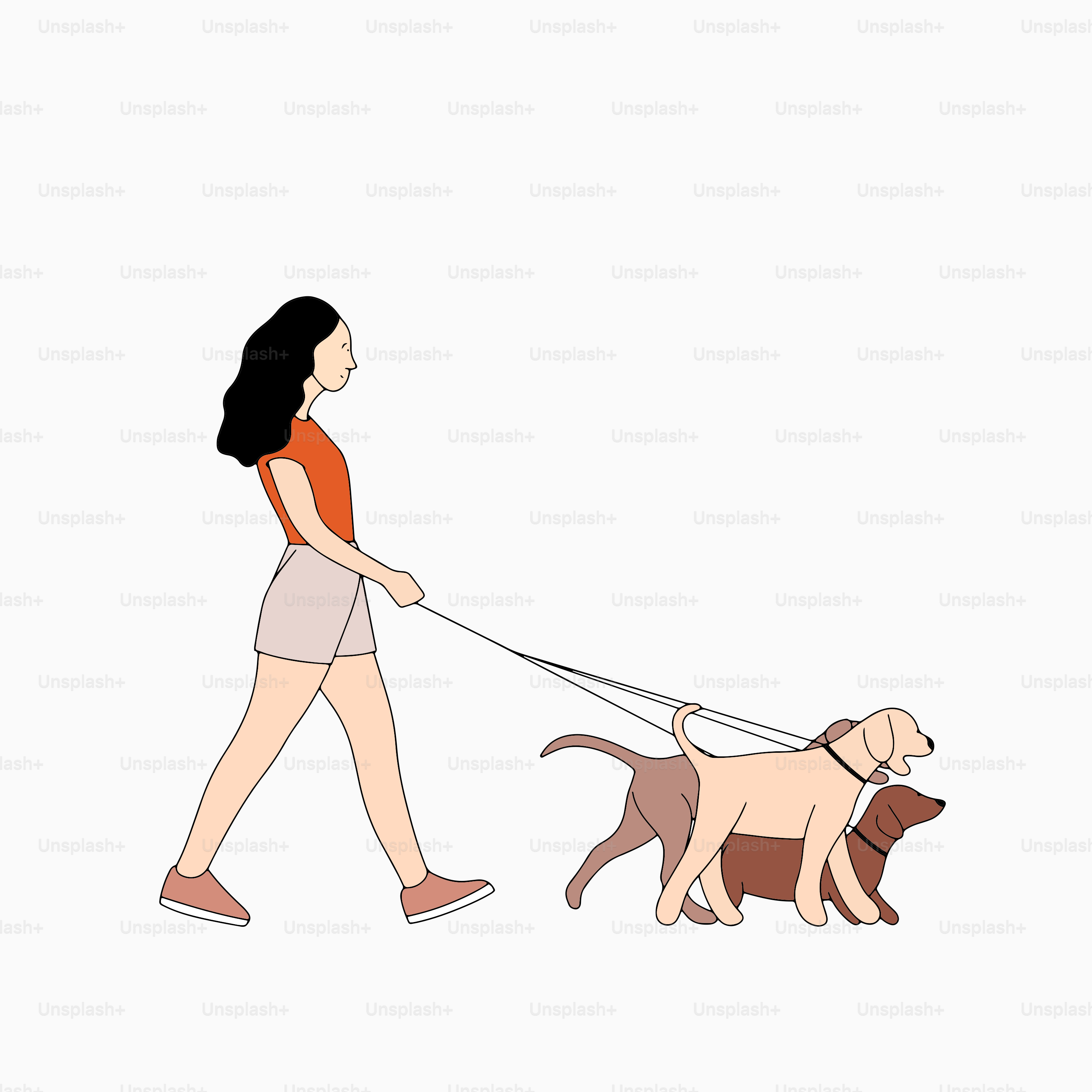A woman walking a dog on a leash