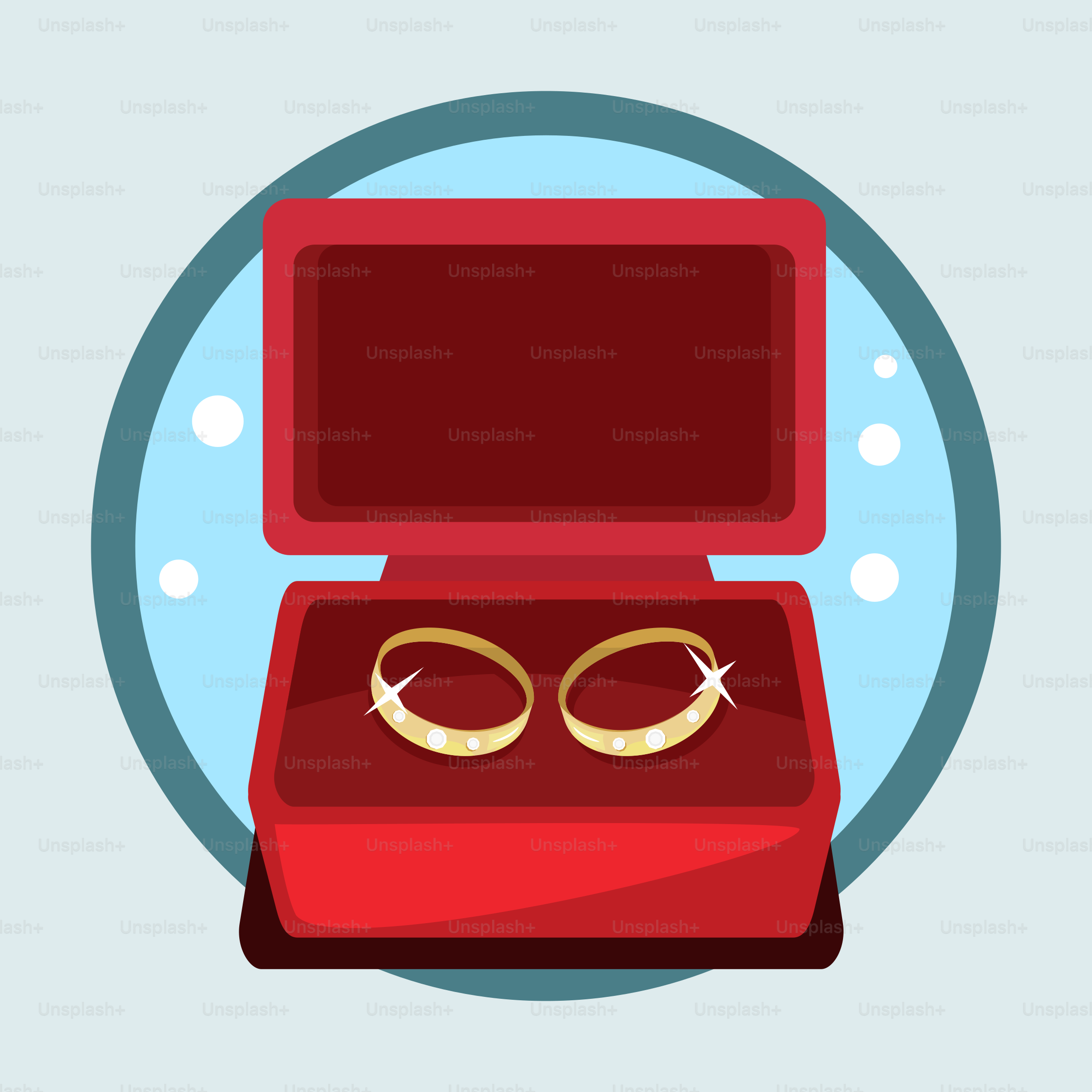 A red box with two gold wedding rings inside