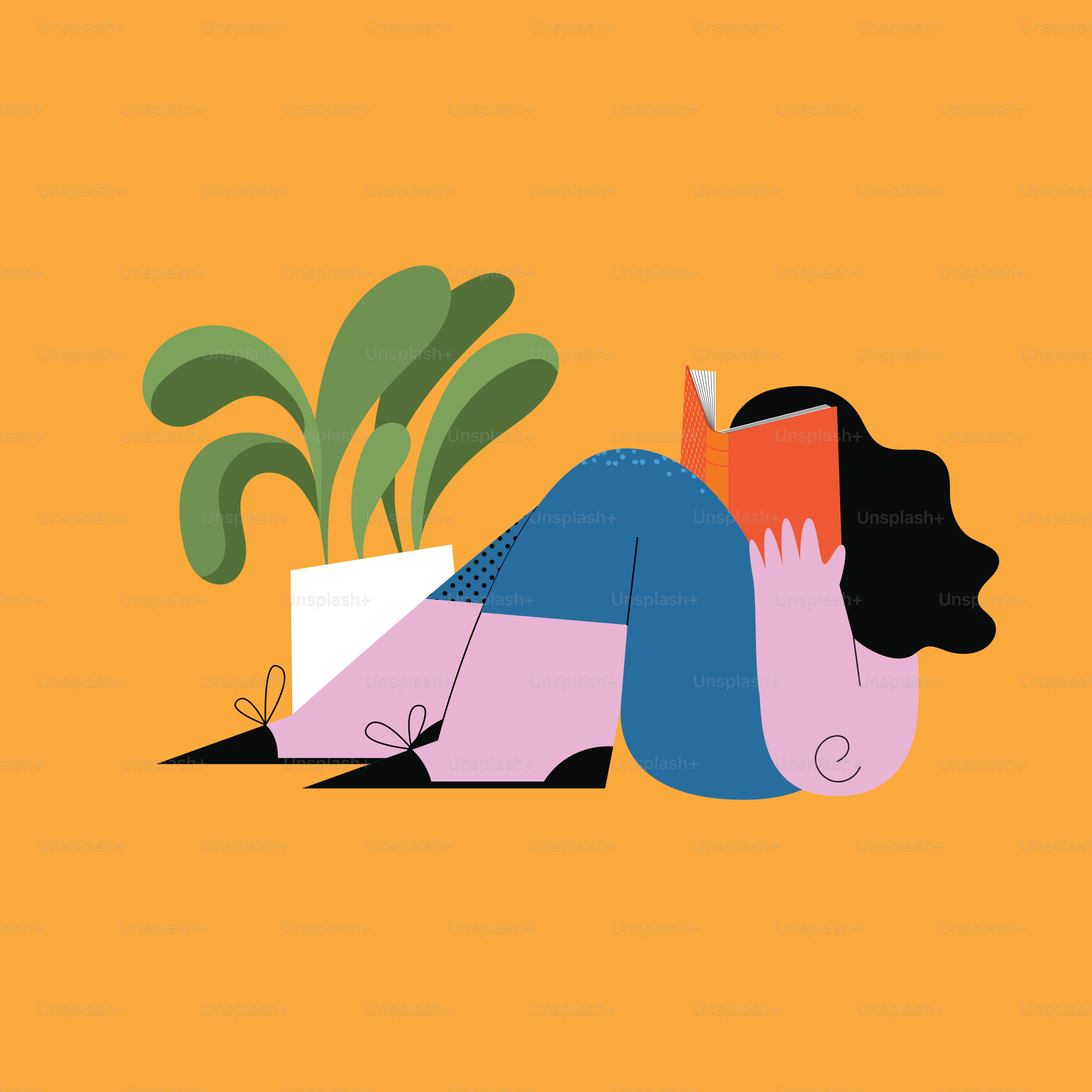 Une femme allongée par terre en train de lire un livre