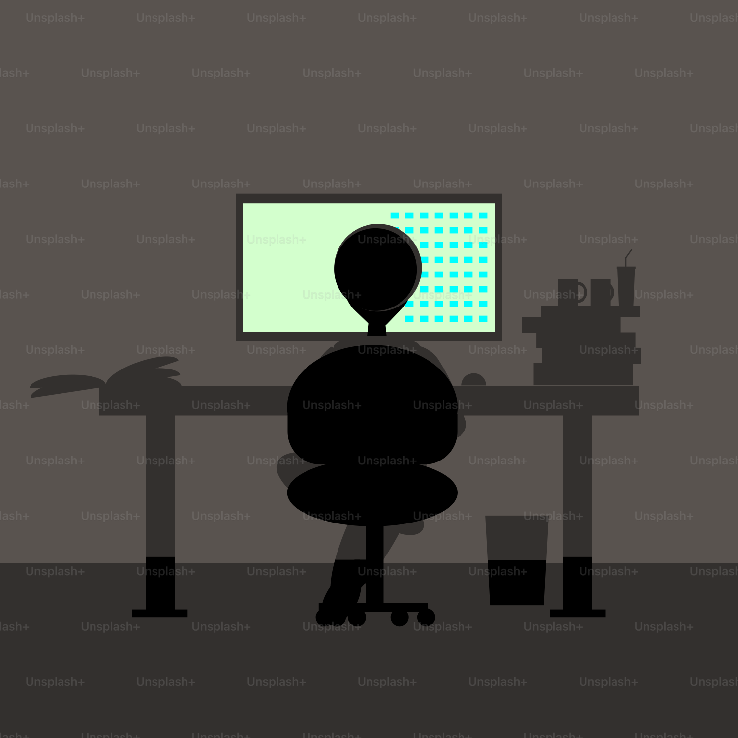 A person sitting at a desk in front of a computer monitor