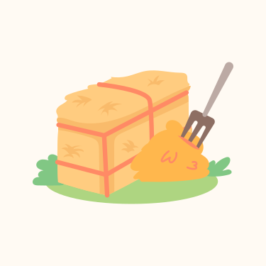 Un tas de foin à côté d’une fourchette