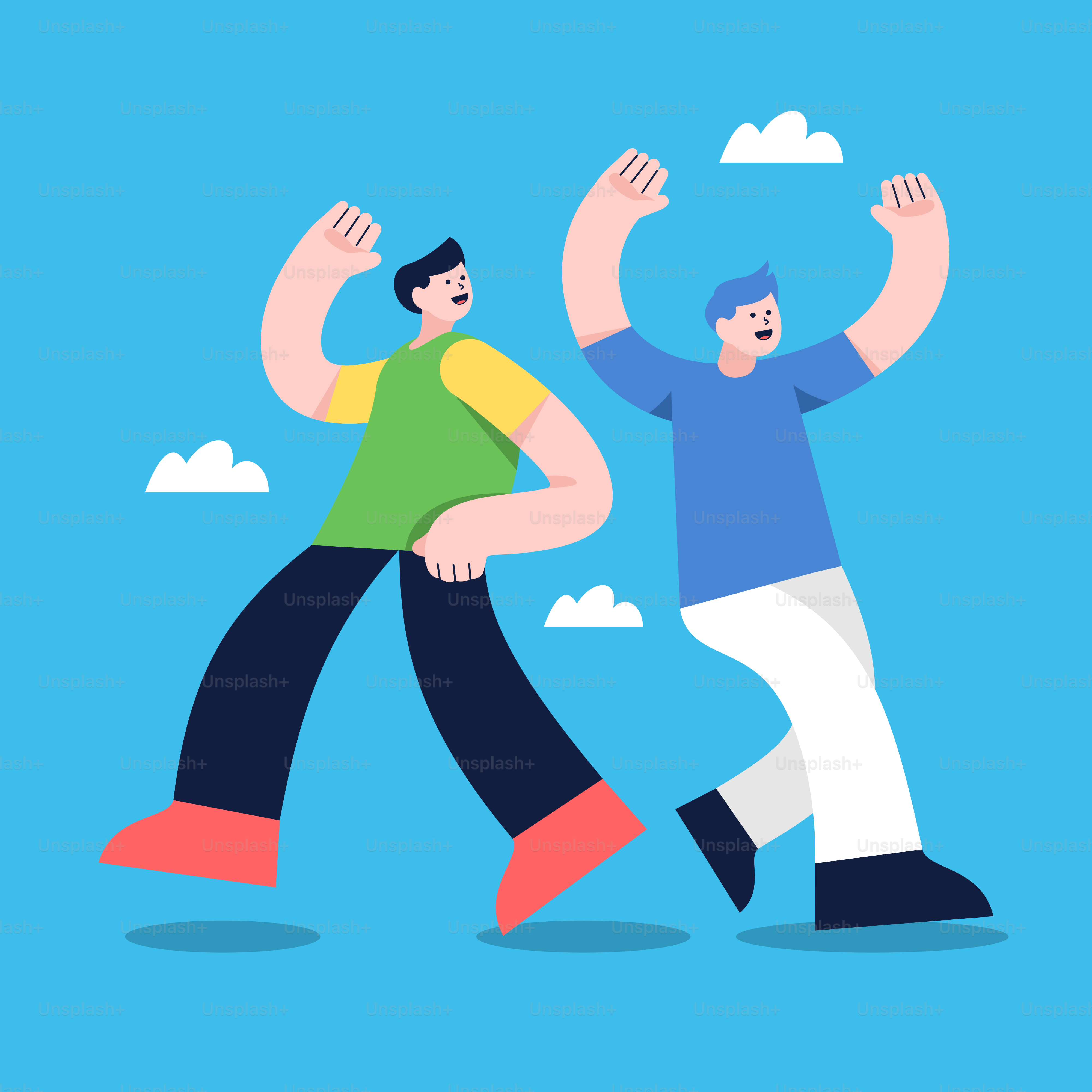 Two men are running and one has his arms in the air