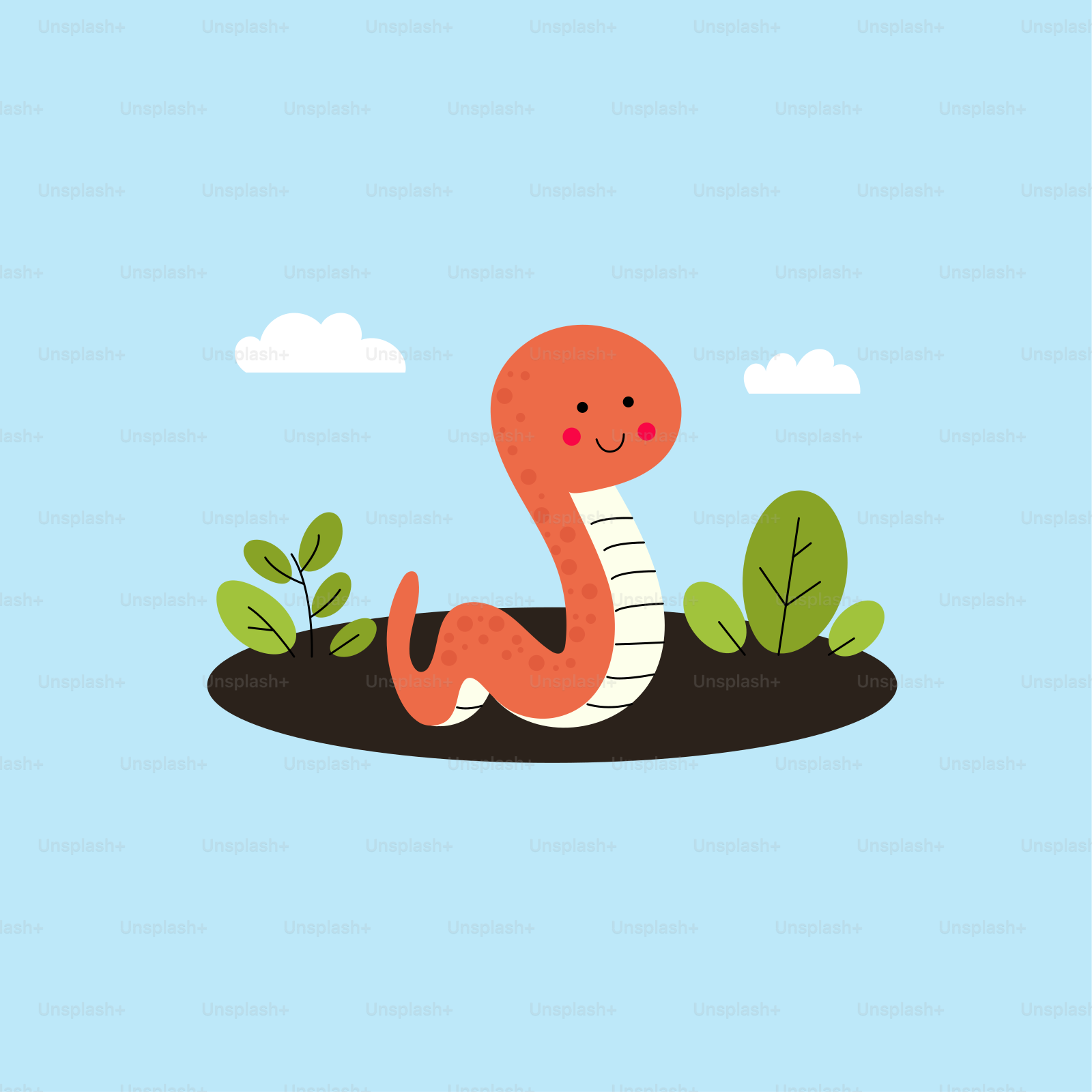 A snake is sitting on the ground in the grass