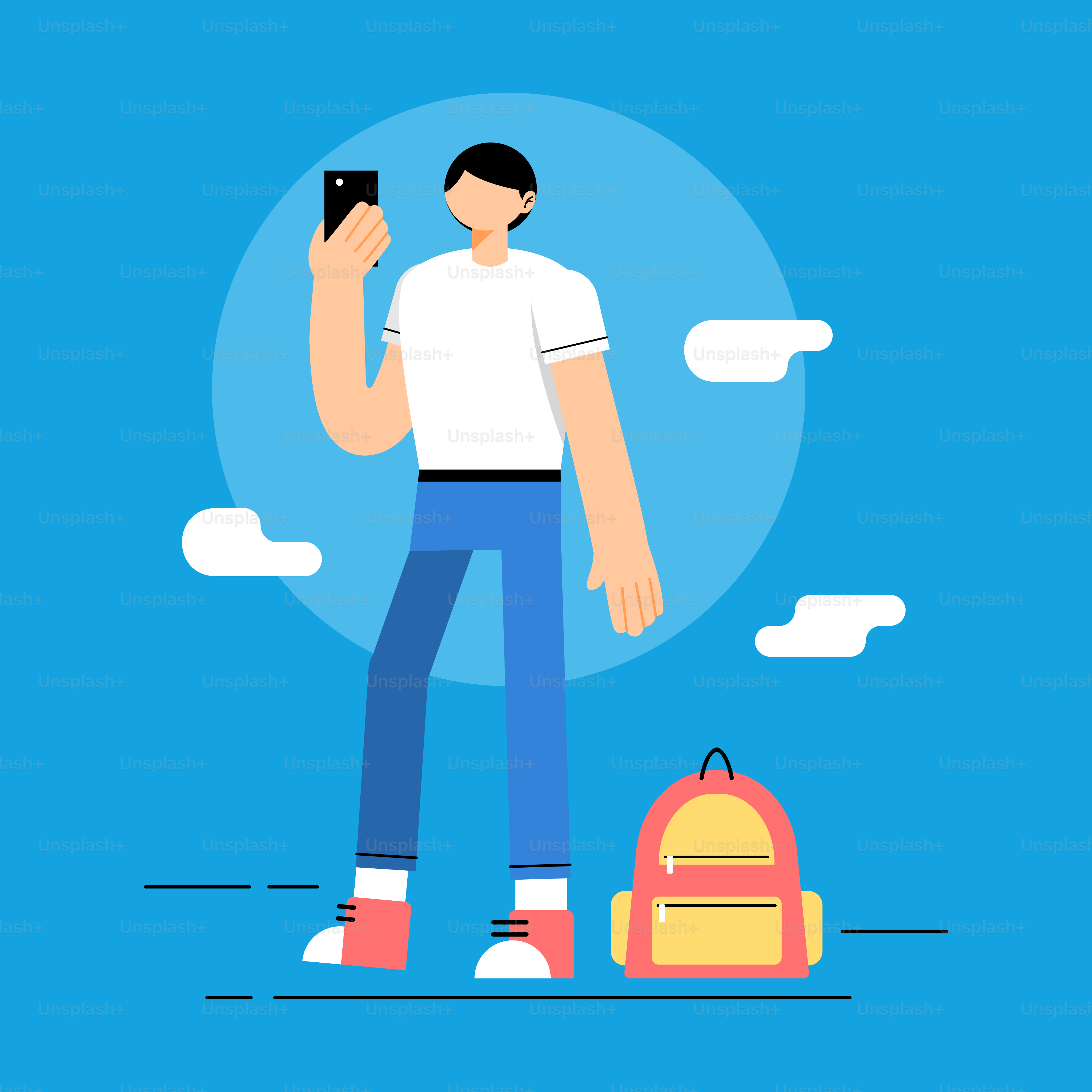 A man holding a cell phone standing next to a backpack