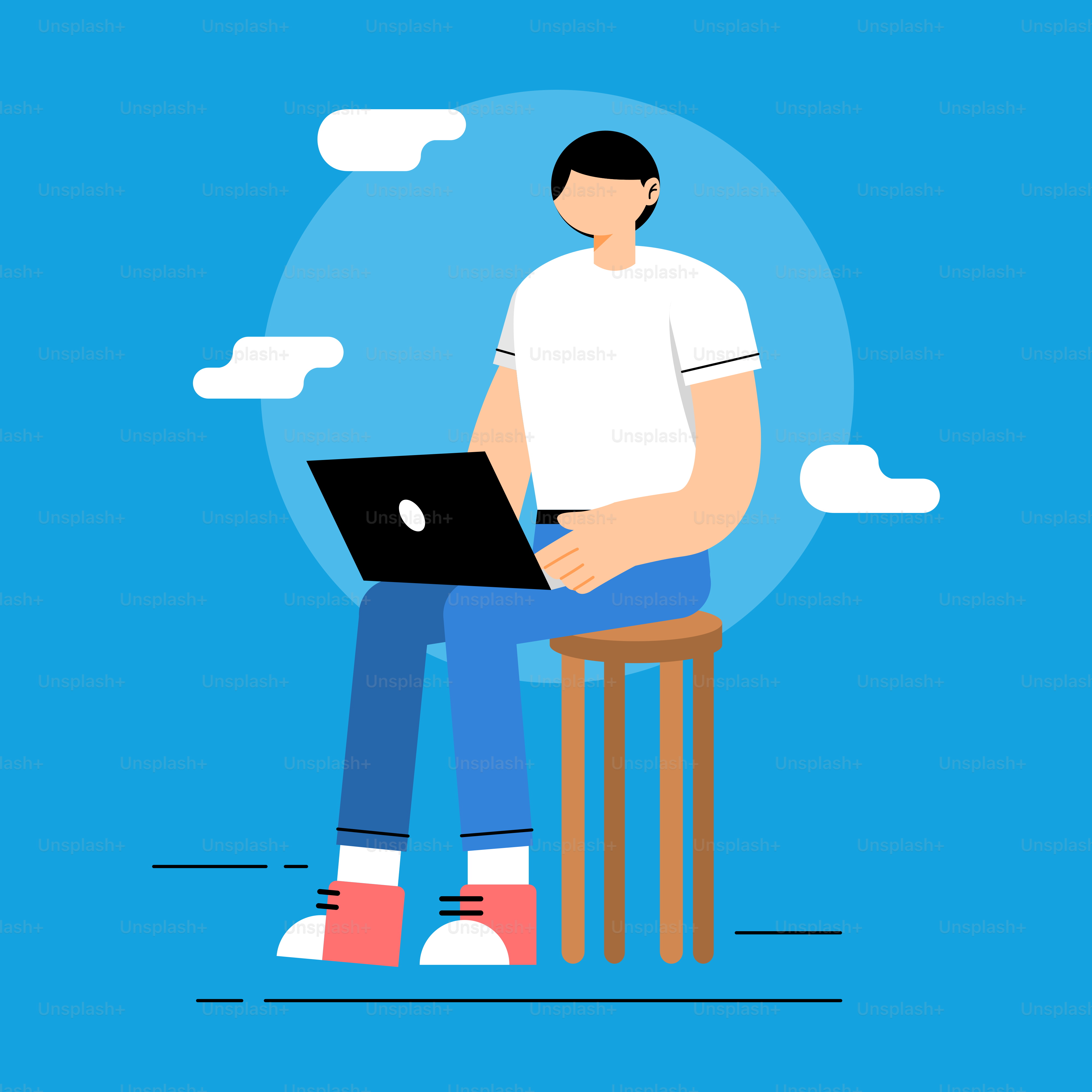 A man sitting on a stool using a laptop