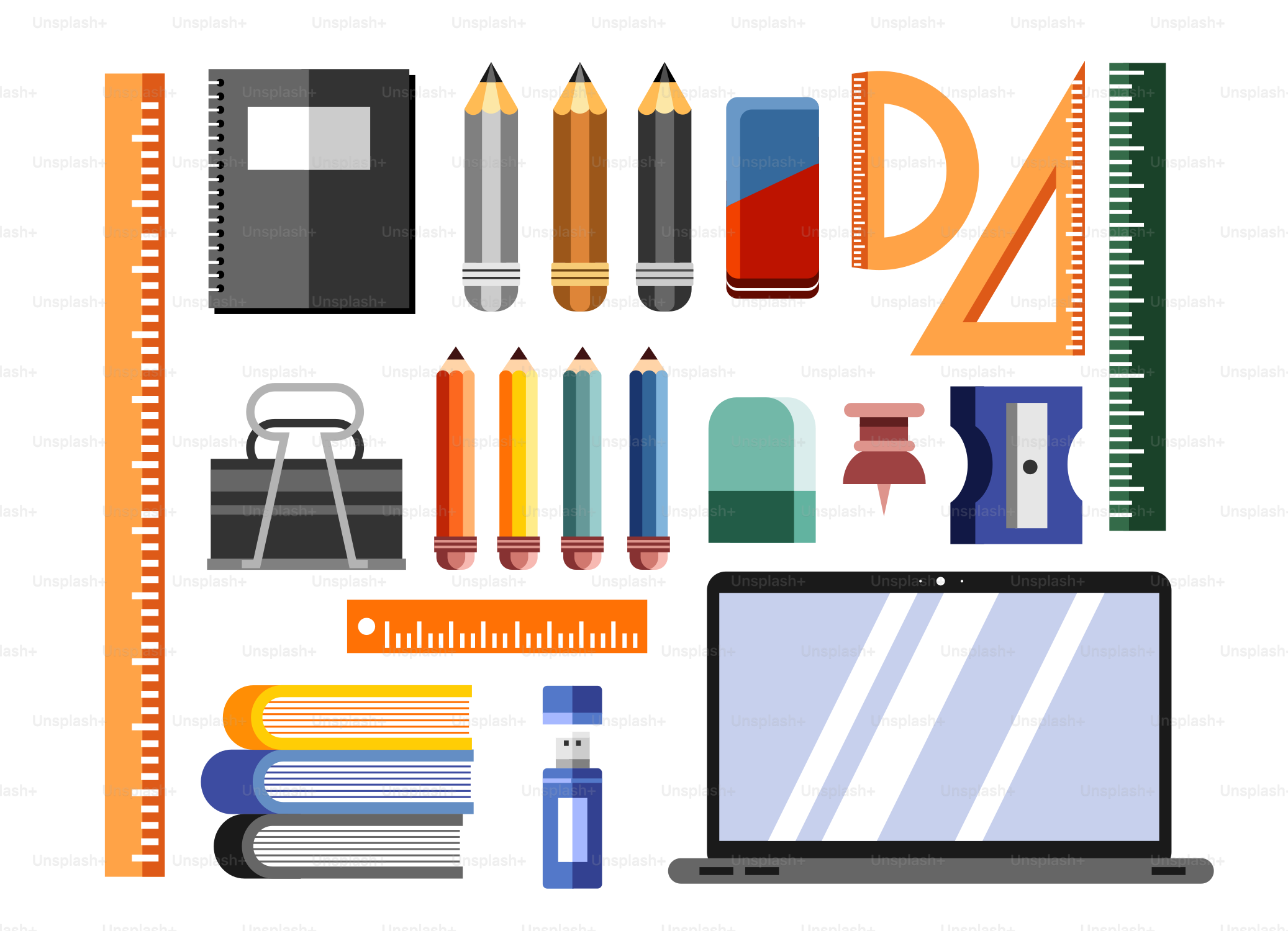 A laptop computer surrounded by school supplies