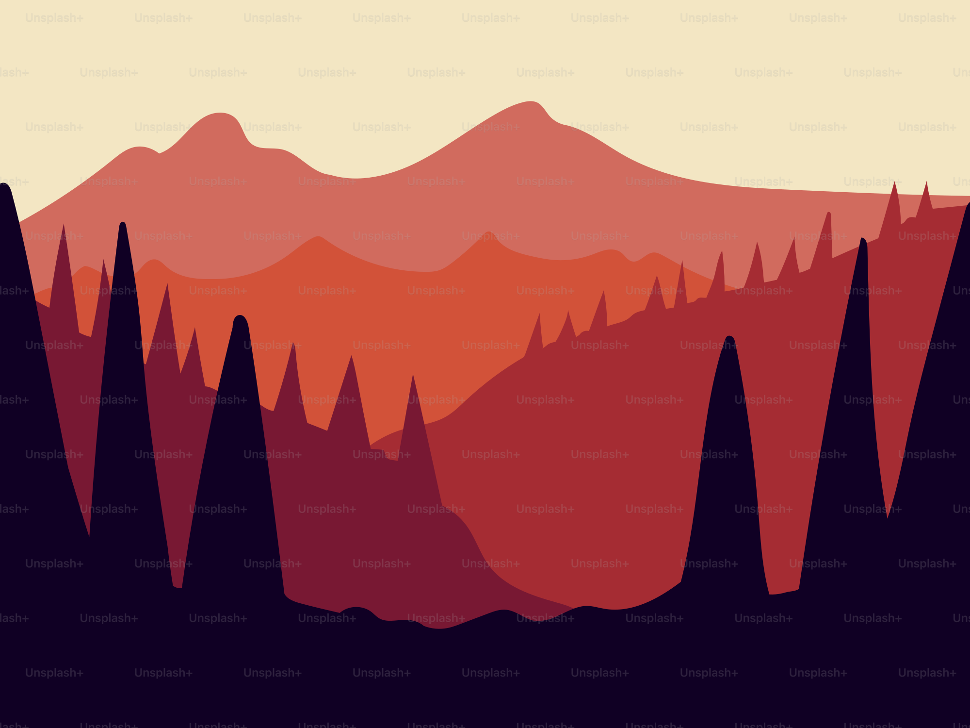 A picture of a mountain range with trees in the foreground