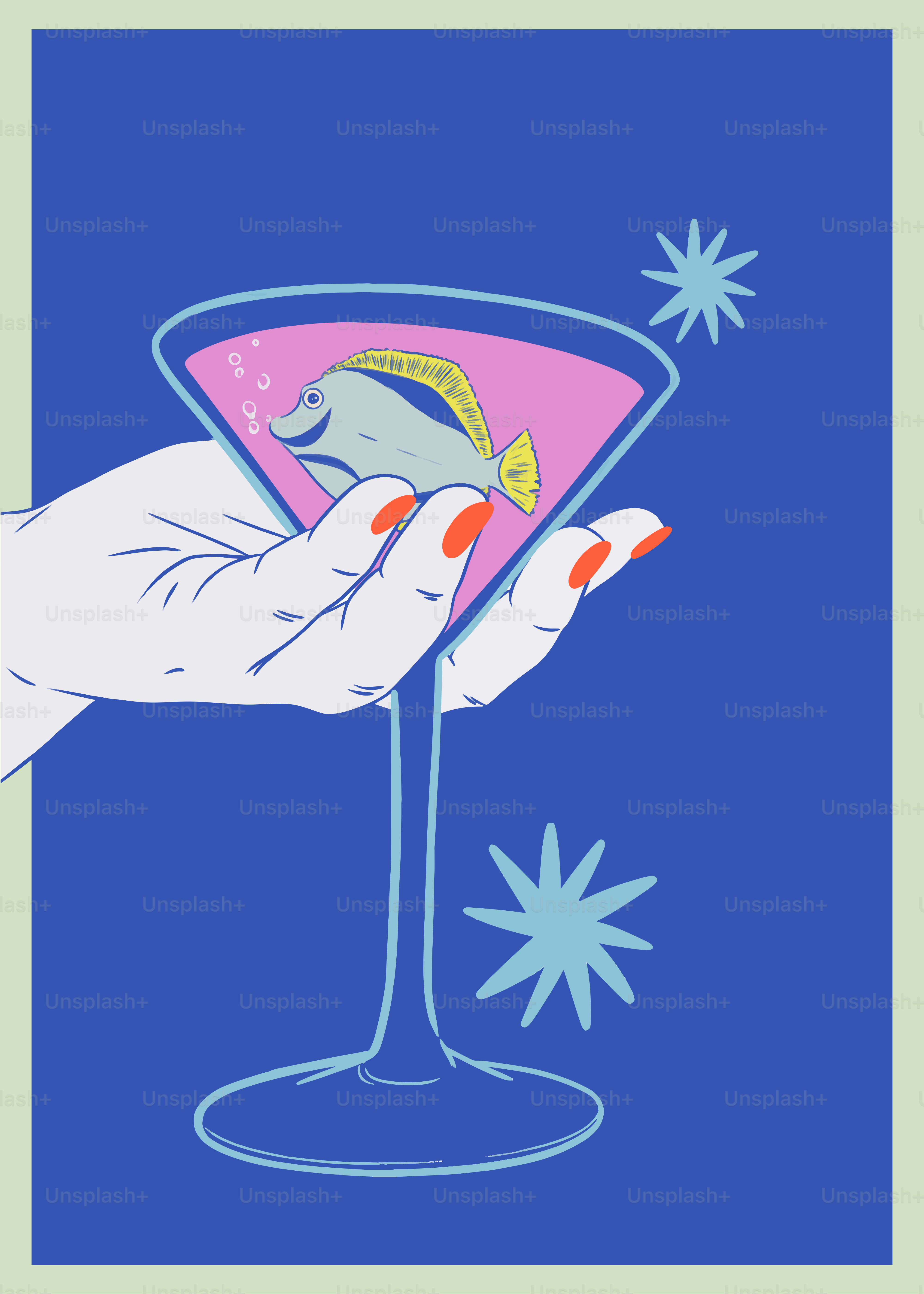 A hand holding a martini glass with a fish on it
