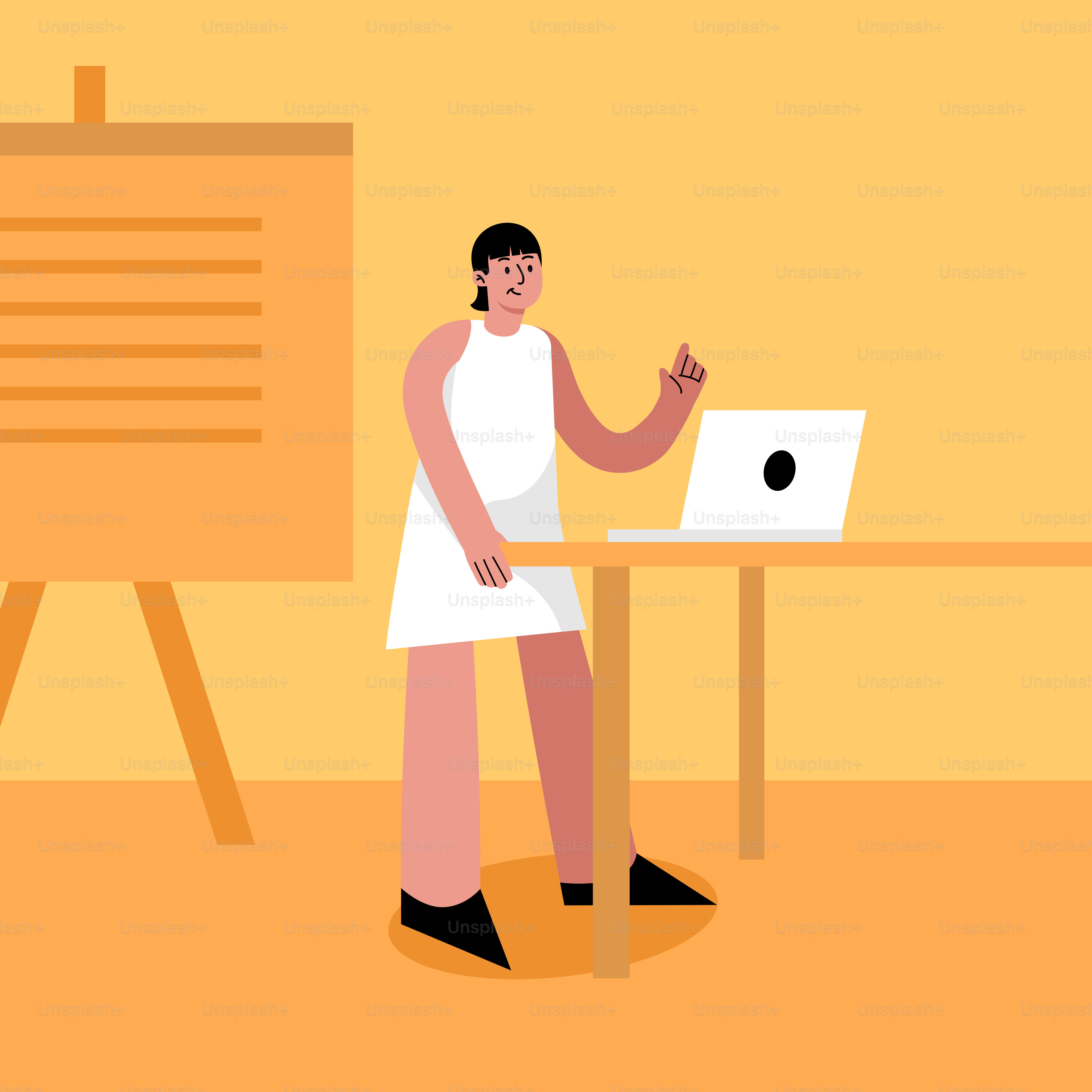 A woman standing in front of a laptop computer