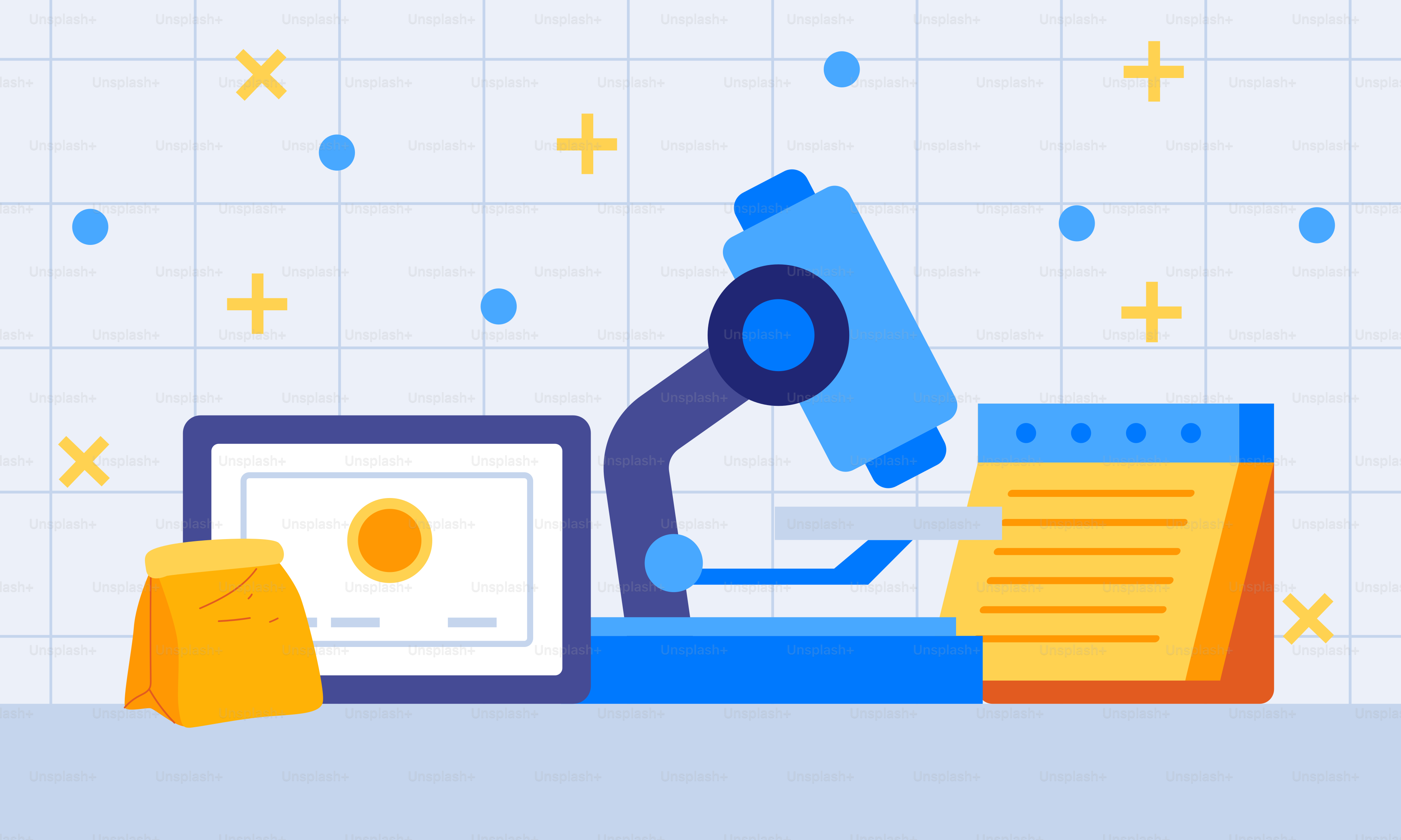 A microscope and a tablet on a table