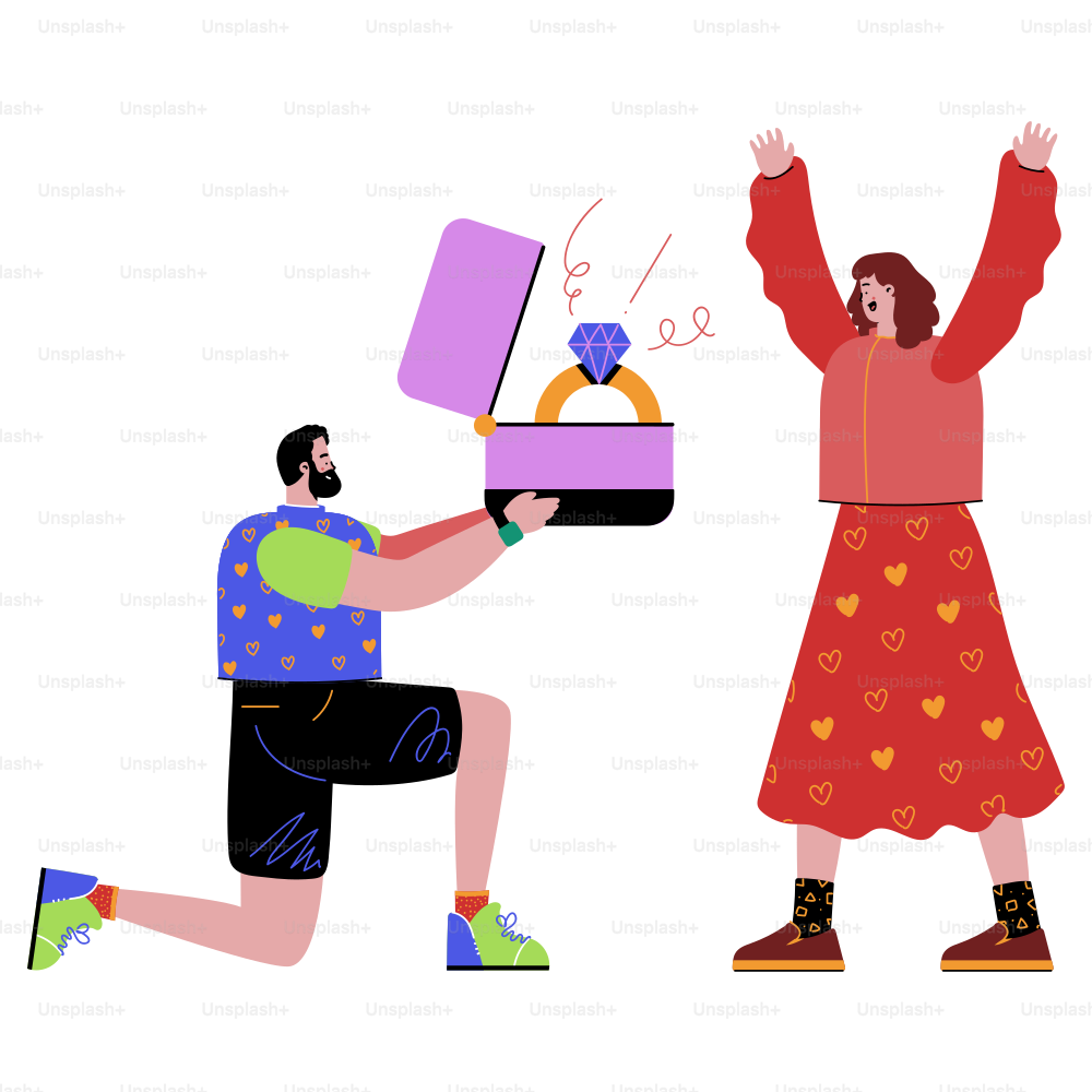 A man kneeling down next to a woman holding a box