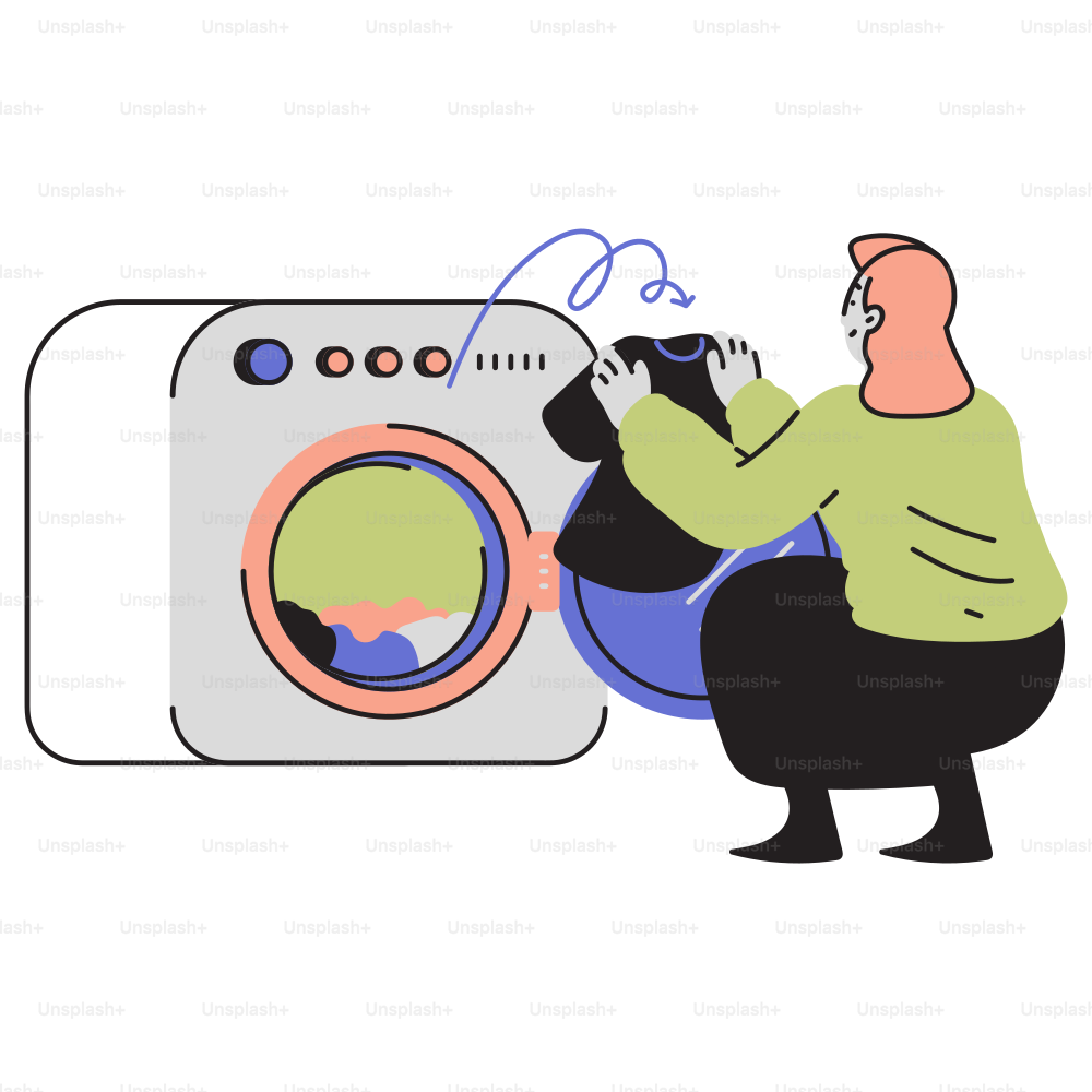 A man sitting in front of a washing machine