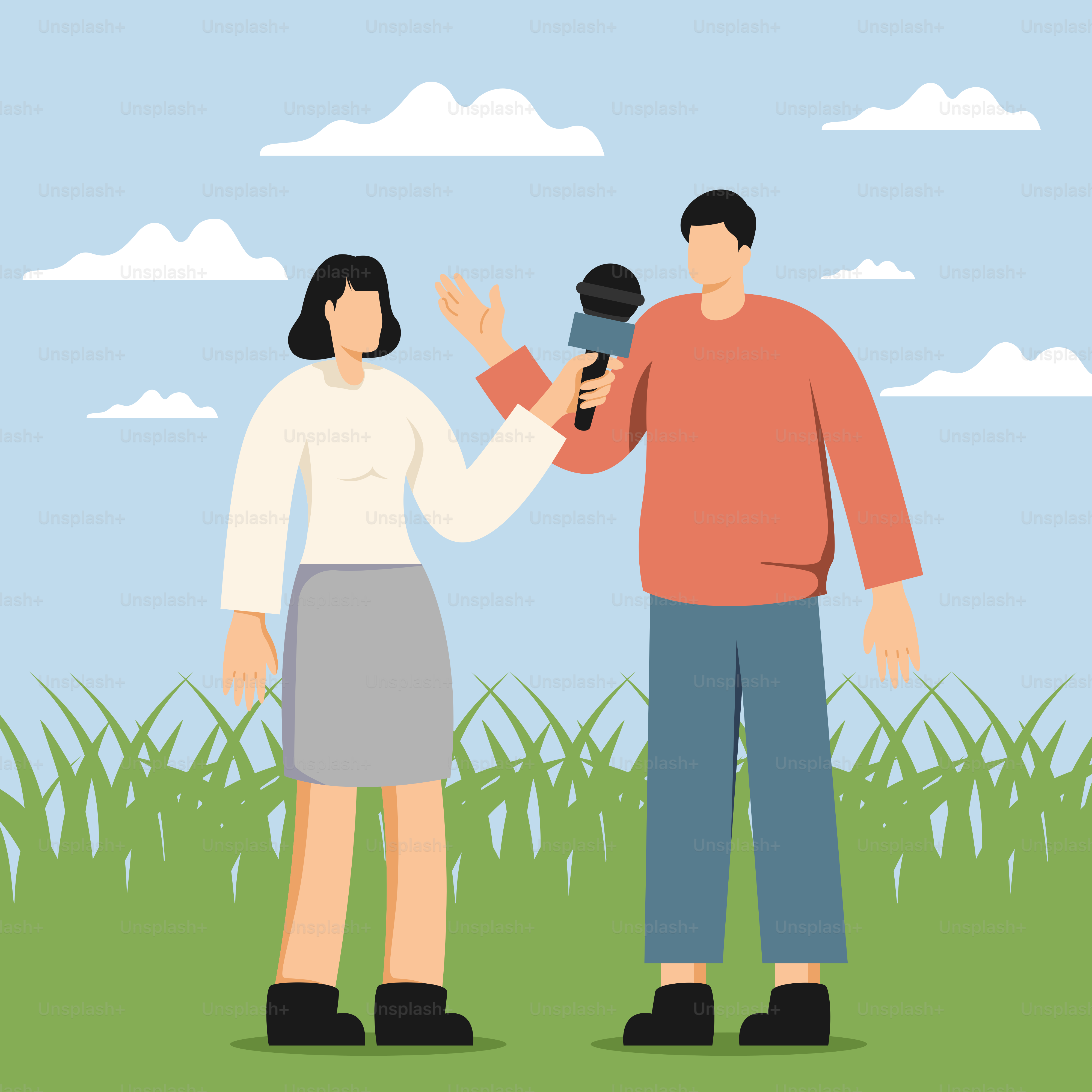 A man and a woman standing in a field