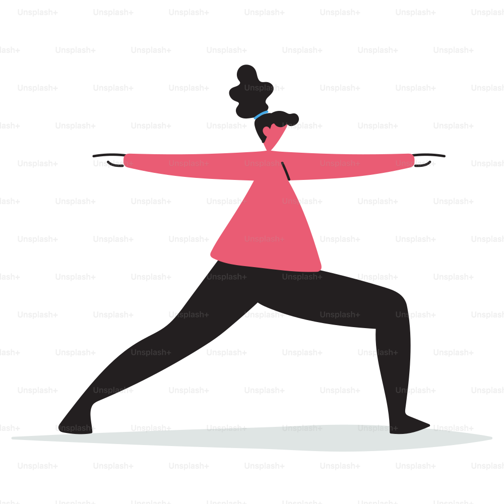 A woman in a pink shirt doing a yoga pose
