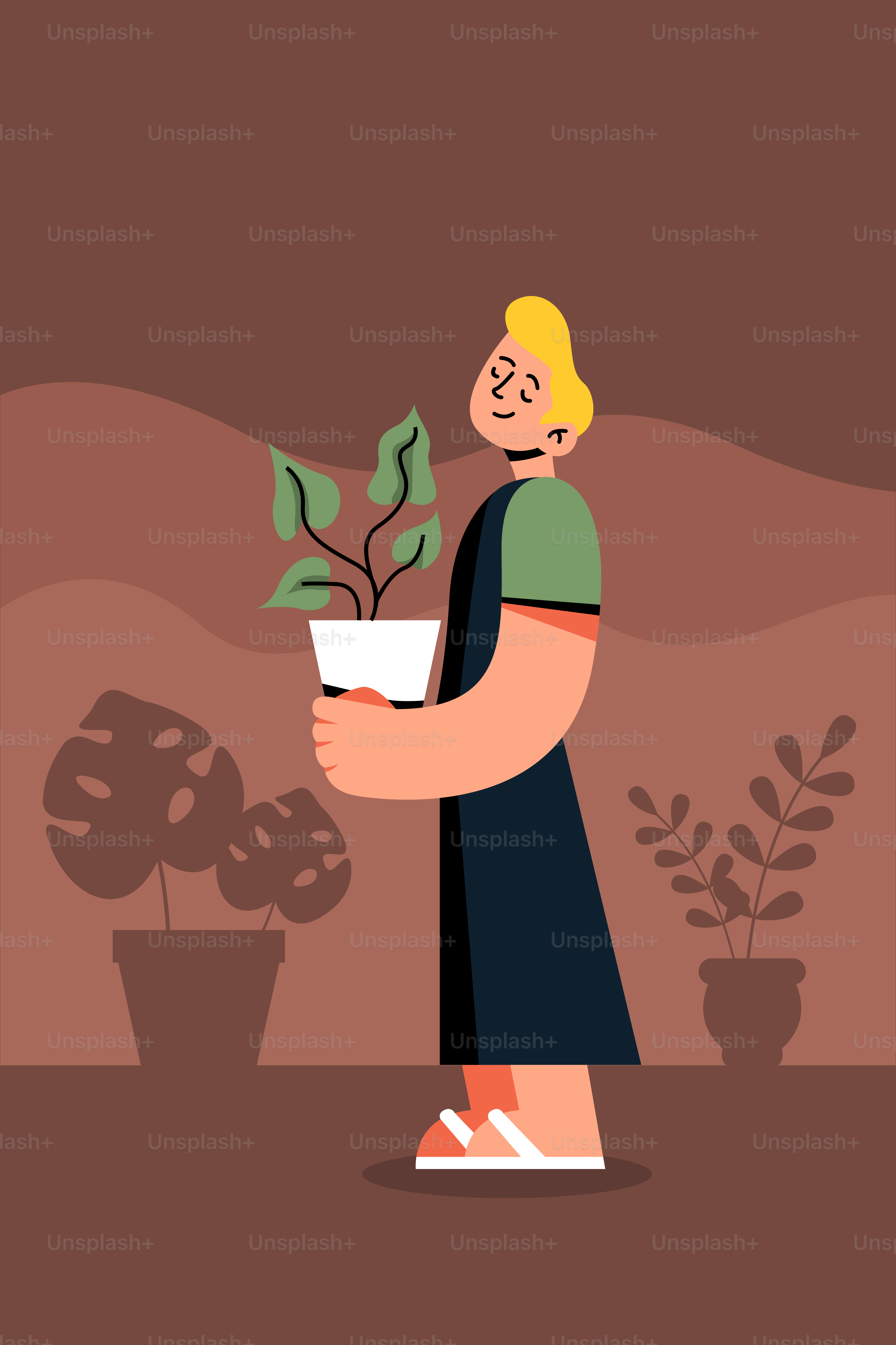 A man holding a potted plant in his hand