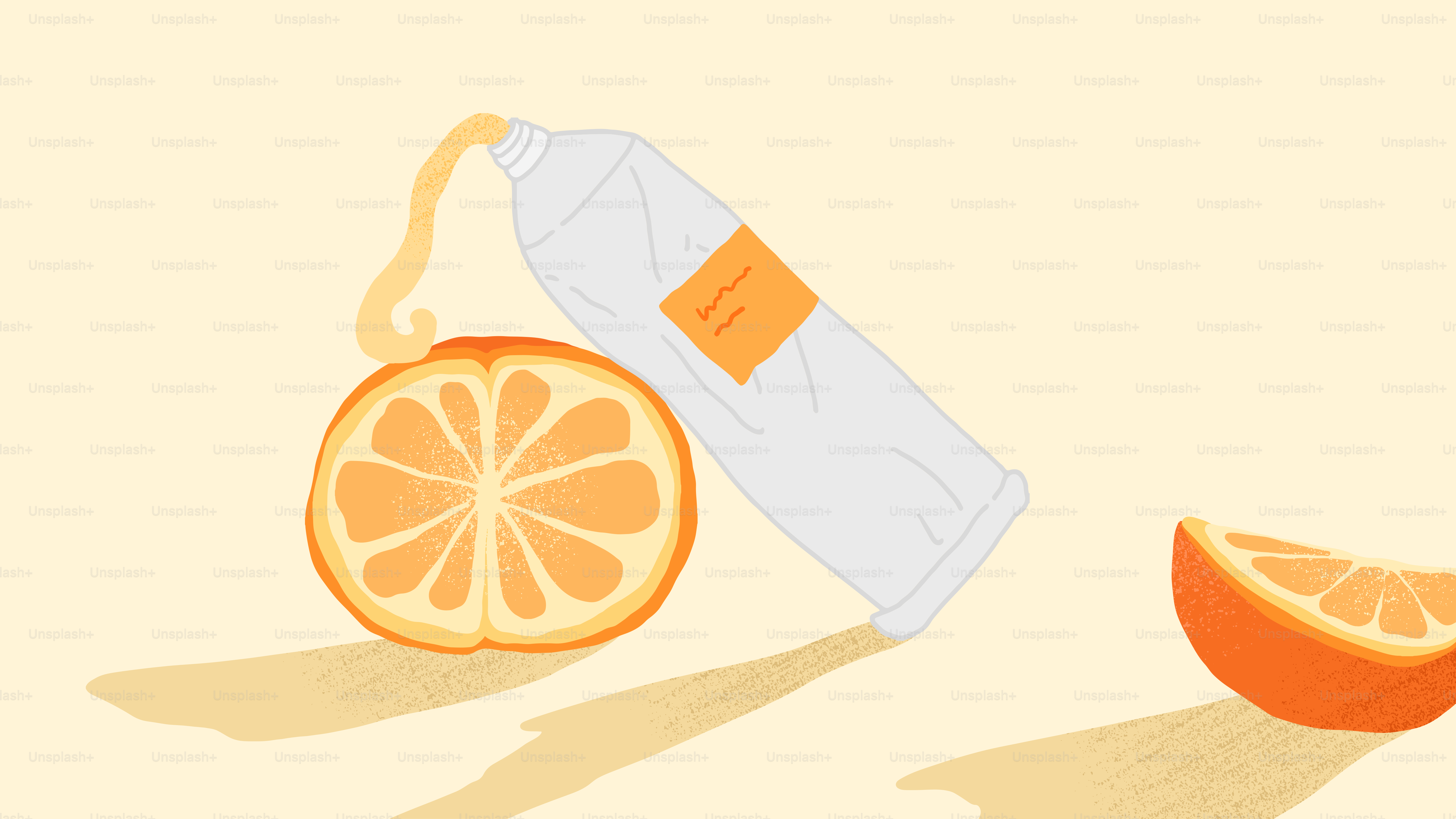 A bottle of orange juice next to a sliced orange