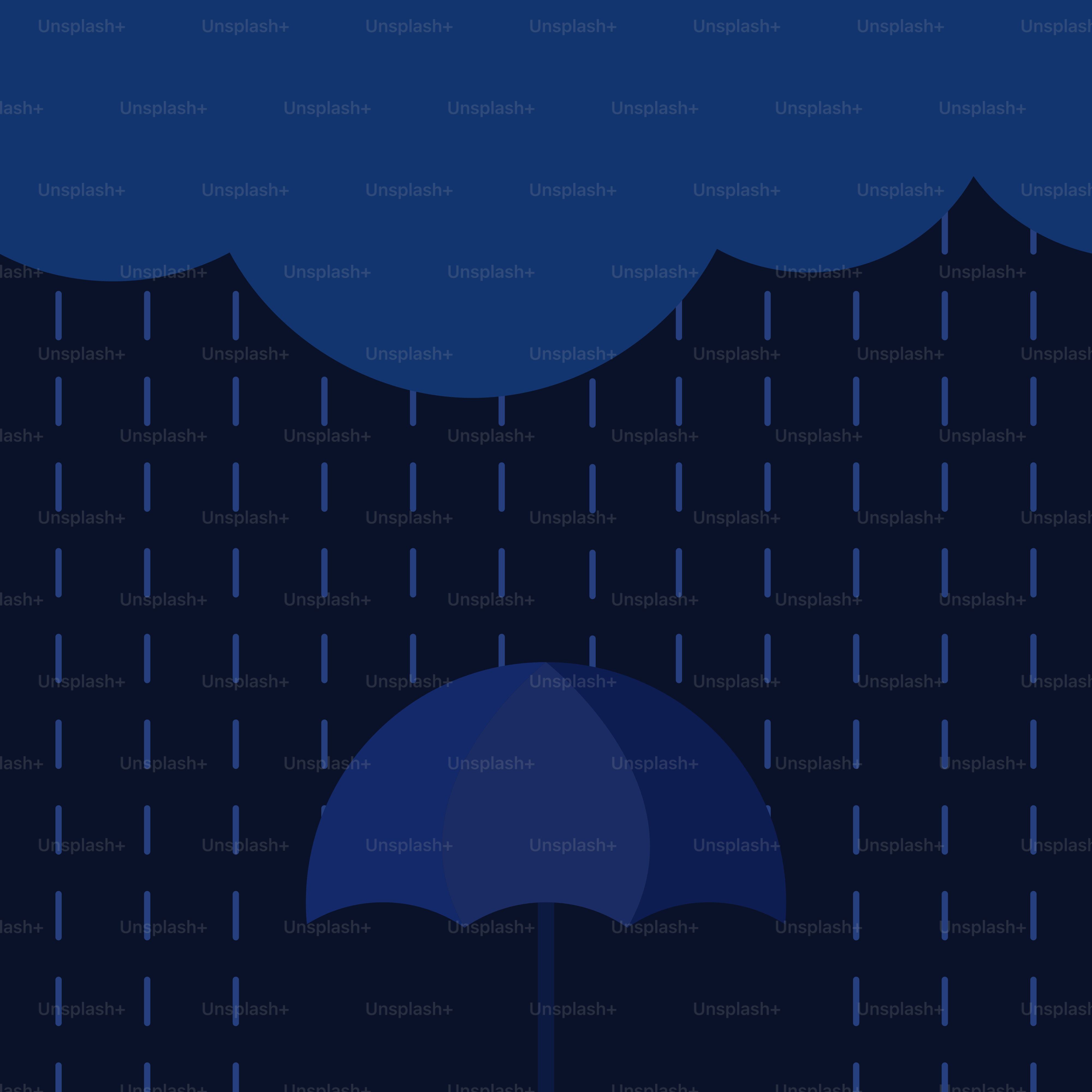 A person holding an umbrella in the rain